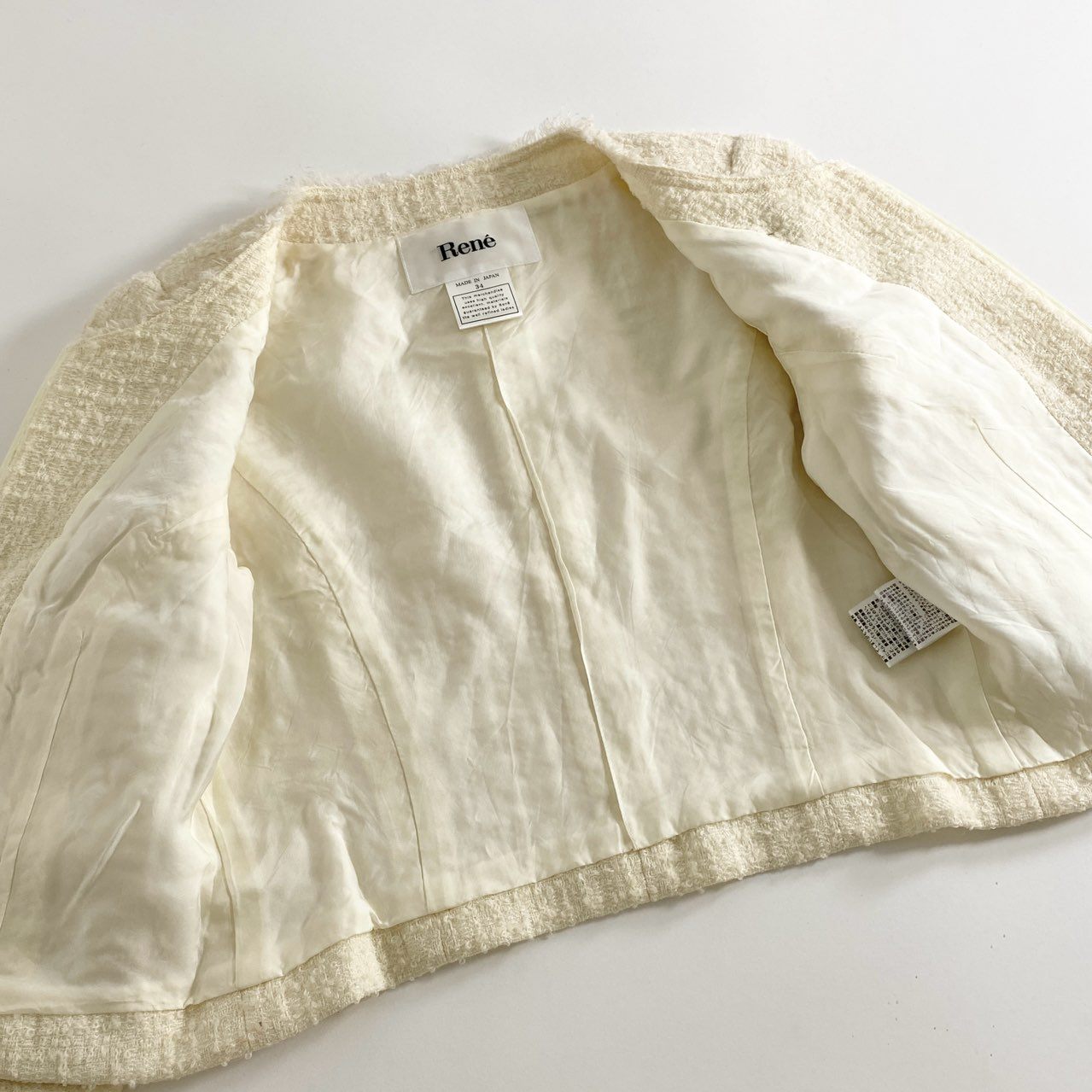 40d15 《美品》 Rene ルネ ツイードジャケット ノーカラージャケット セレモニージャケット ジップツイードカーディガン パールジップ 6743190 サイズ34 クリーム レディース 日本製 春