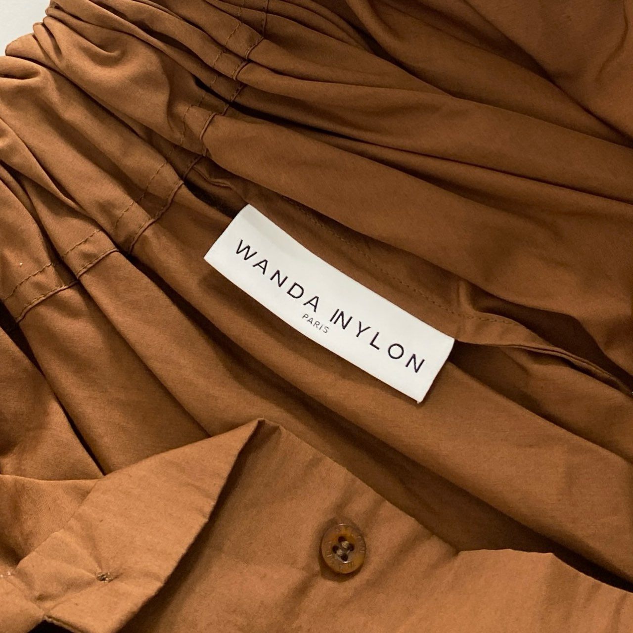 87i4 フランス製 WANDA NYLON ワンダナイロン ユナイテッドアローズ取扱 変形 スカート ボトムス 1577-343-3573 サイズ34 オレンジ コットン100% レディース