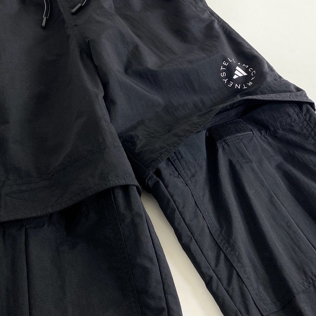 87i1 adidas STELLA McCARTNEY アディダス ステラマッカートニー ウーブンソリッドトラックパンツ ボトムス IJ0564 S ブラック