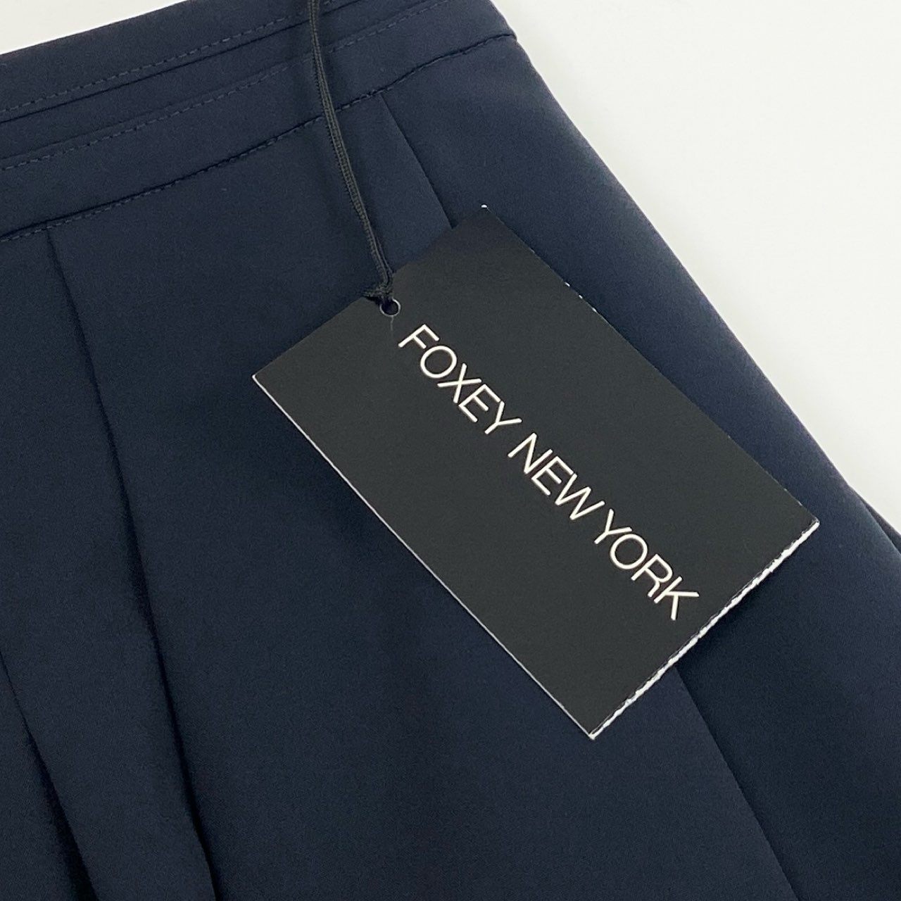 55f16 【未使用タグ付き】FOXEY NEW YORK フォクシー ニューヨーク 伸縮ストレッチ 膝丈プリーツスカート ミッドナイトブルー サイズ38 ネイビー レディース 春夏 スカート