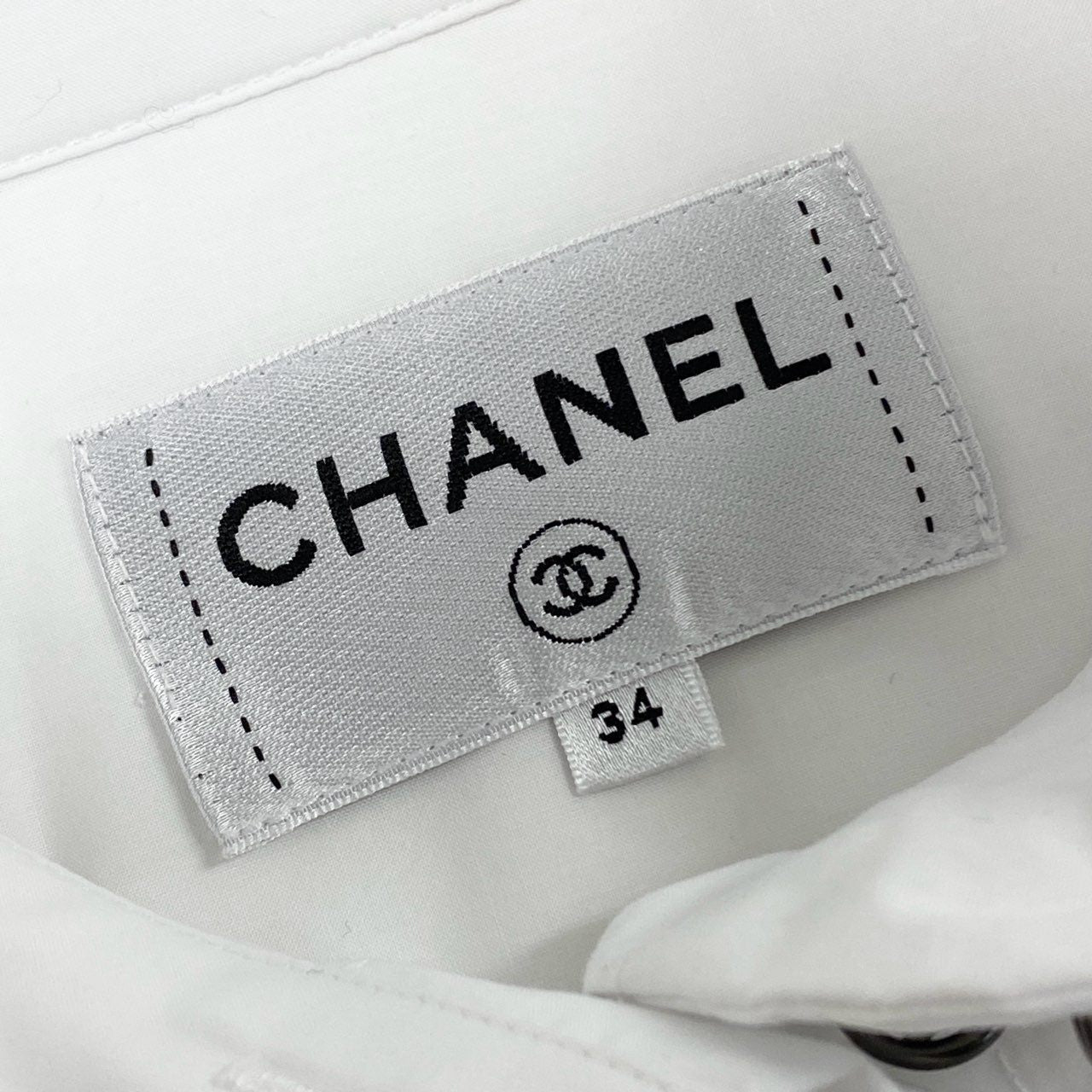 24l14 CHANEL シャネル P60861V44129 ココマークボタン 長袖シャツ シャツブラウス サイズ34 ホワイト レディース