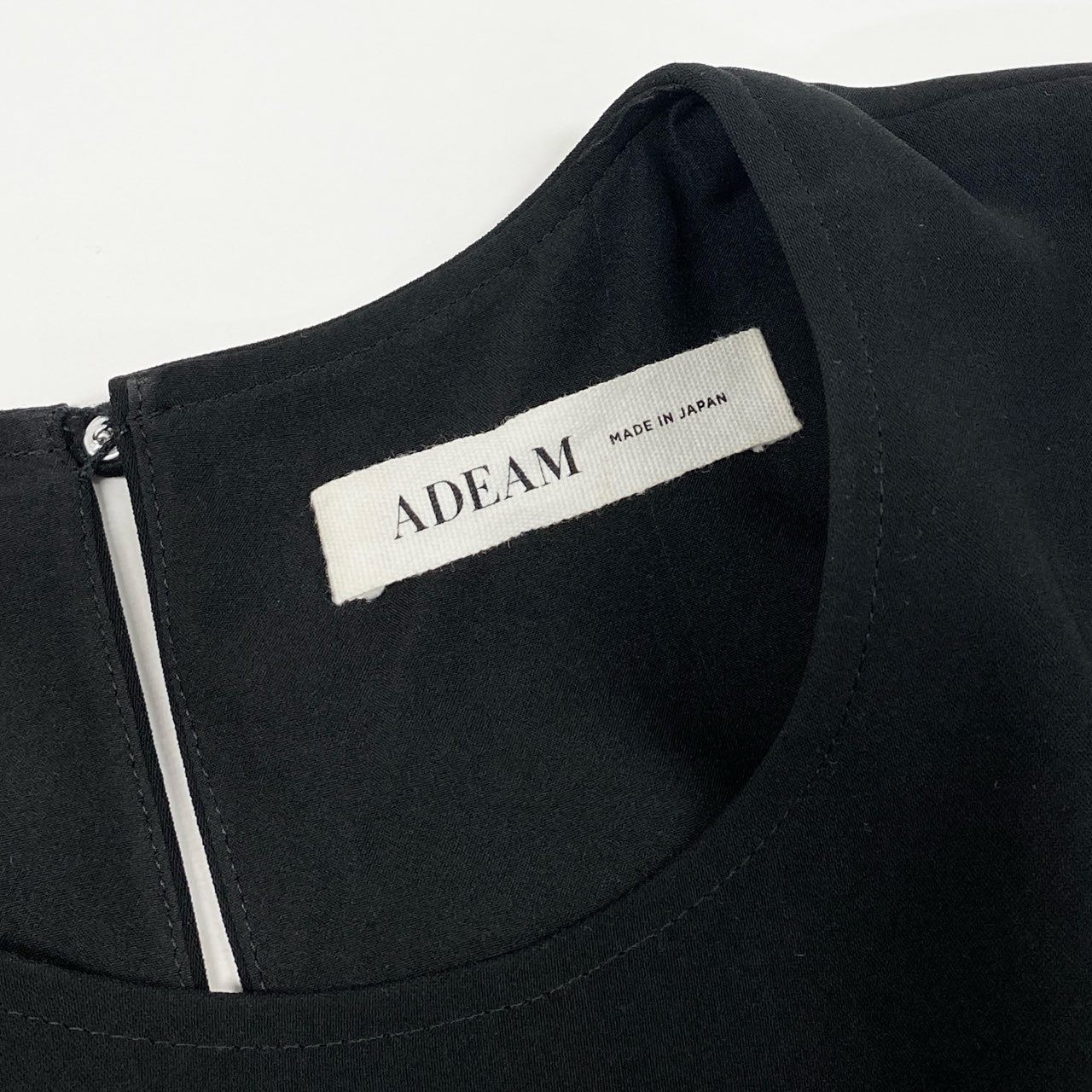 4c28 【美品】 ADEAM アディアム チュニック トップス アシンメトリー 半袖カットソー 半袖ブラウス プリーツ 裾フレア 39163 0 ブラック ポリエステル