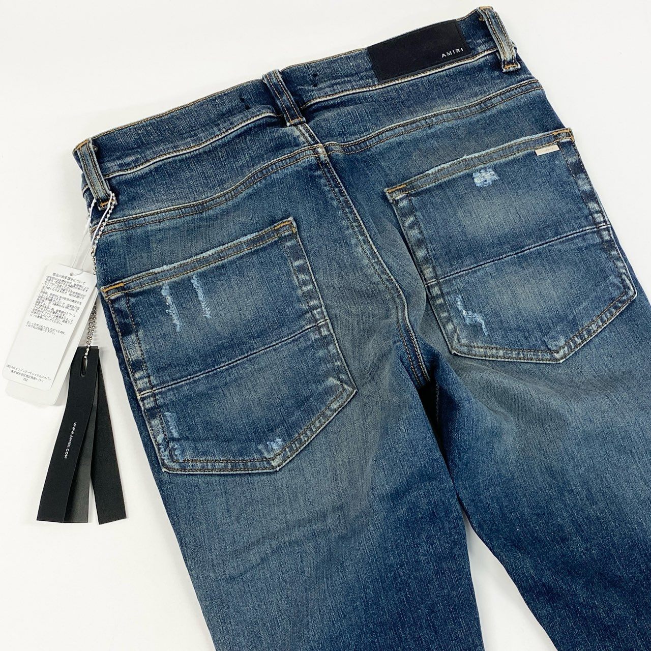 19g28《未使用》タグ付 AMIRI アミリ 蛇腹ダメージ加工 スキニーデニムパンツ ジーンズ ボトムス クラッシュ加工 SR1PXMD001SAMDSI 28 インディゴブルー コットン メンズ