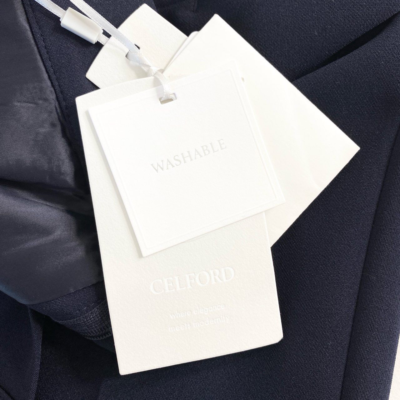 19d4 《未使用》 定価¥17,600 CELFORD セルフォード センタープレス テーパードパンツ 36 ネイビー WASHABLE スラックス タグ付き