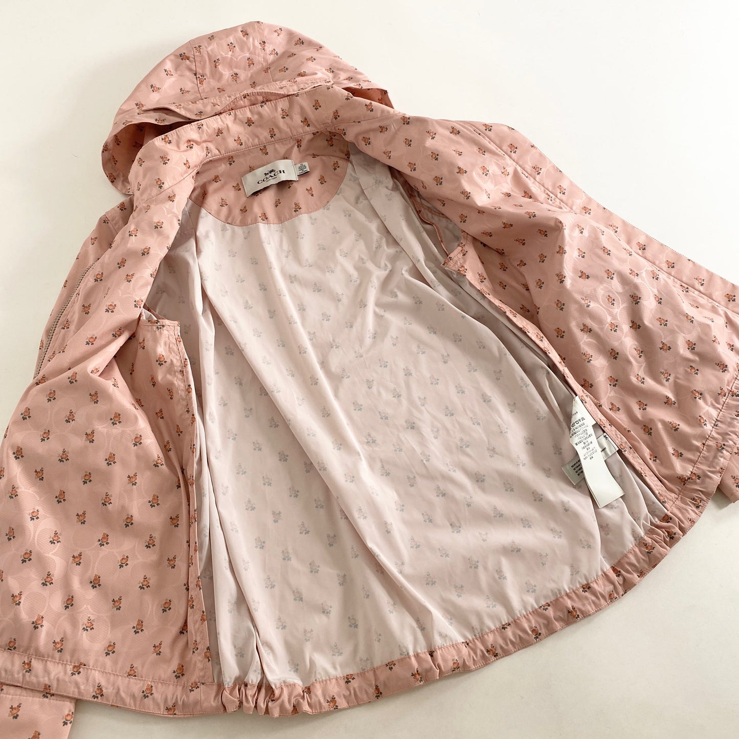 4L9《美品》COACH コーチ SIG FLORAL WNDBRKR ウィンドブレーカー XS ピンク F67477 花柄 フラワー ジャケット