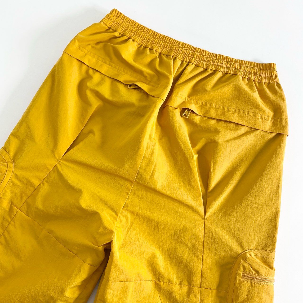 48C13 F/CE. エフシーイー RECYCLE TECH TRACK PANTS テック素材 トラックパンツ M オレンジ メンズ RSU0323M0001