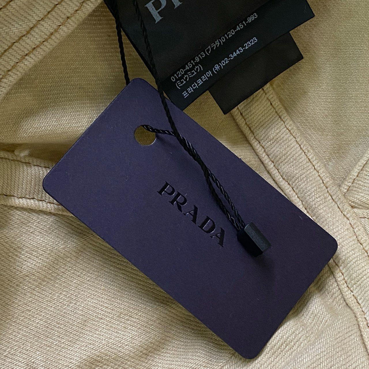 c4 【未使用】PRADA プラダ 2HC274 サイズL 三角ロゴプレート デニムキャップ 帽子 ベージュ ユニセックス ヘッドギア