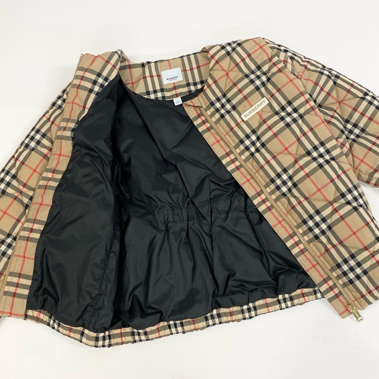 Ic18 BURBERRY バーバリー ノバチェック 中綿ジャケット ノーカラージャケット ジャンパー レディース 女性服 14Y/レディースM相当 ベージュ系k02i