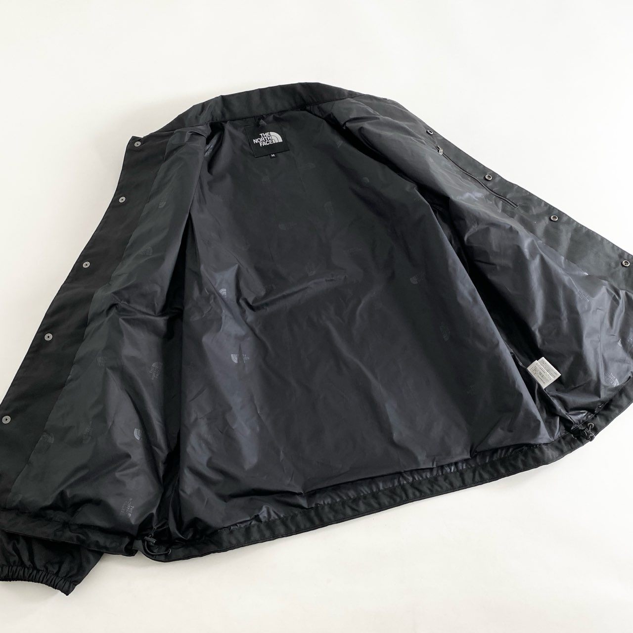 67i5 THE NORTH FACE ザノースフェイス NEVER STOP ING THE COACH JACKET ネバー ストップ アイエヌジー ザ コーチ ジャケット NP72335 Mサイズ ブラック 画像参照