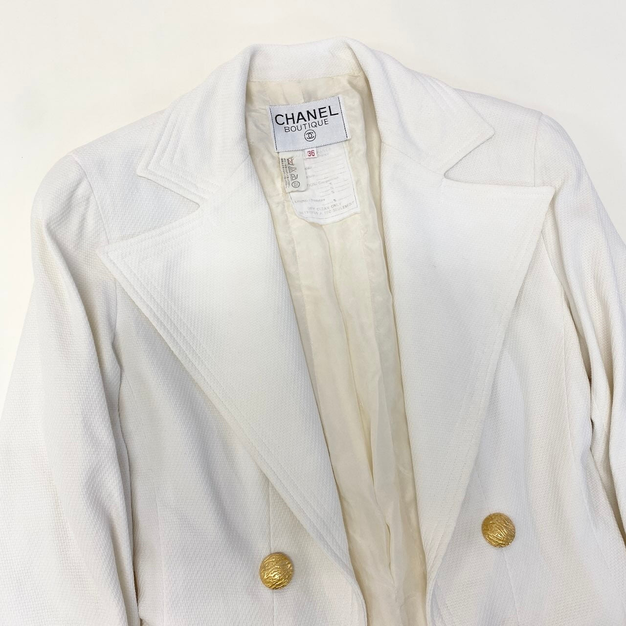 Ce27 CHANEL BOUTIQUE シャネル テーラードジャケット ココマークチェーン 金ボタン サイズ36 ホワイト レディース 女性服ta1