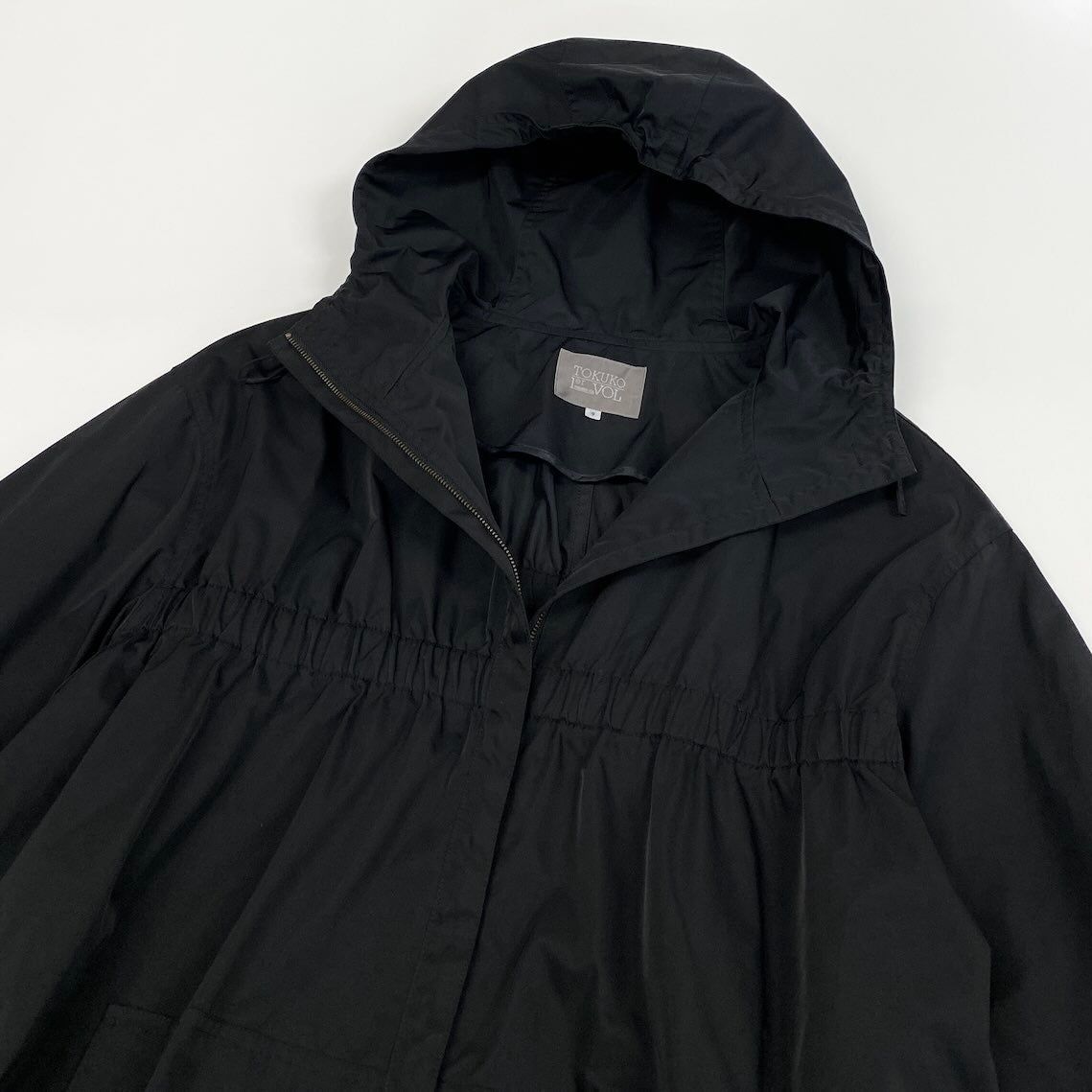 16c11 TOKUKO 1er VOL トクコプルミエヴォル フルジップコート スプリングコート 薄手 フーデット 裾調整可 レディース 女性服 サイズ9 ブラック ポリエステル100％u02t