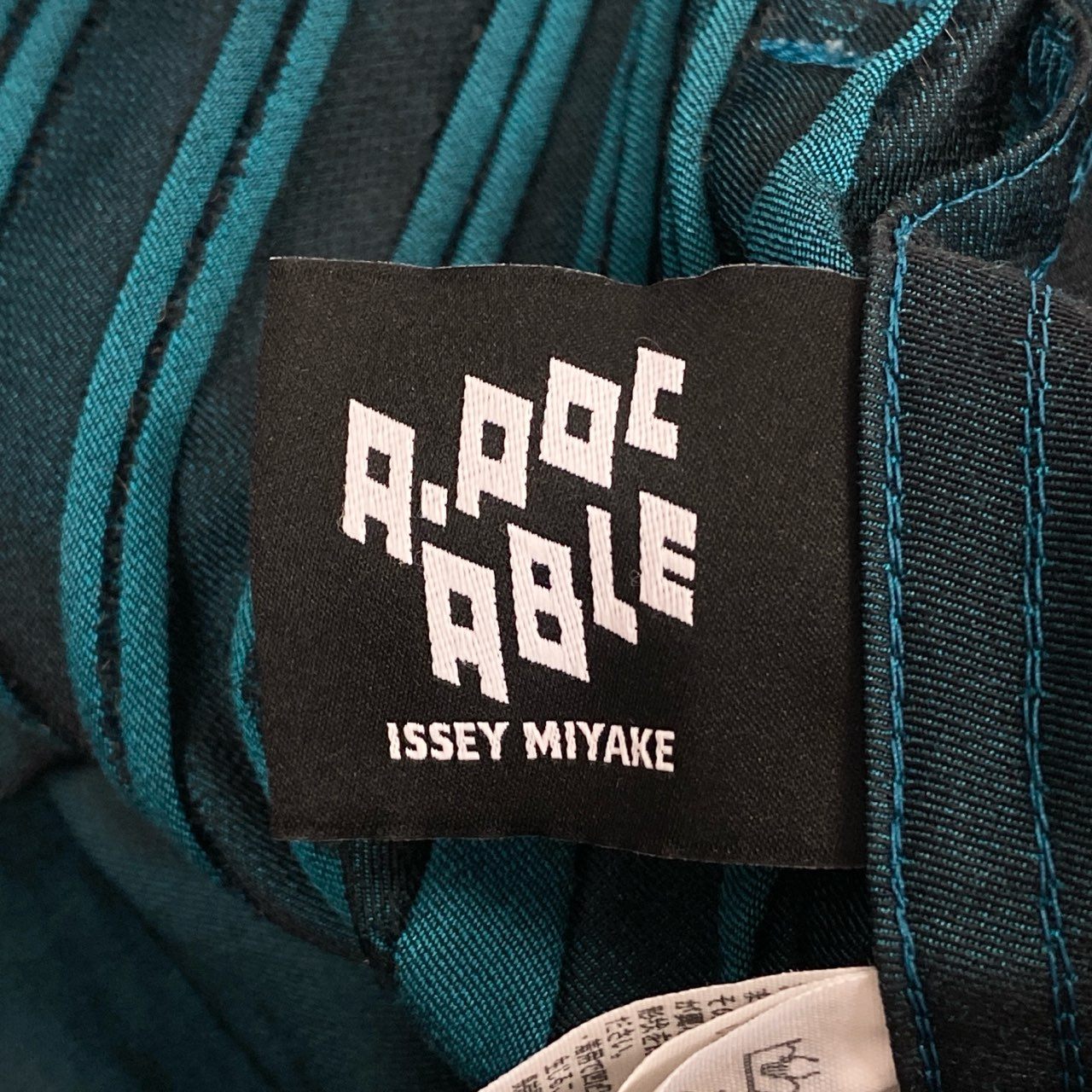 12i25 A-POC ABLE ISSEY MIYAKE イッセイミヤケ クロップドパンツ テーパードパンツ エイポック エイブル サイズ2 グリーン メンズu02t