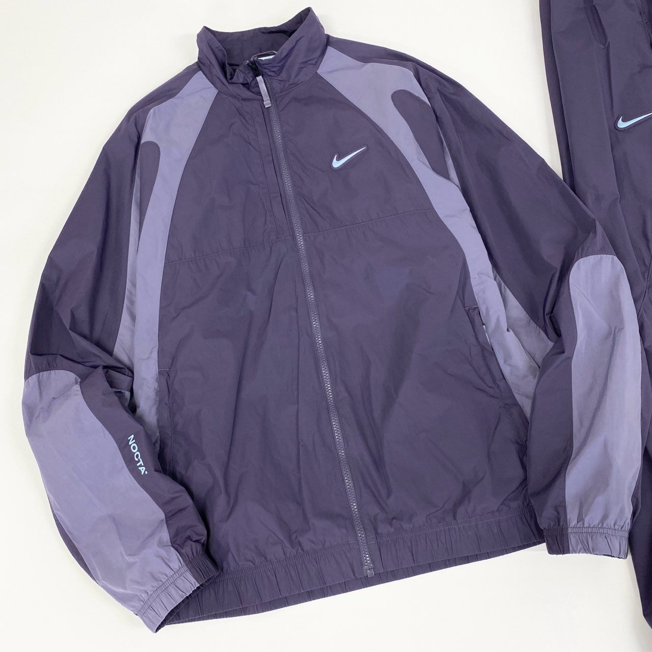 57f6 NIKE x NOCTA ナイキ ノクタ コラボ NRG DY TRACK JACKET PANT セットアップ トラックジャケット パンツ ボトムス DO2807-573 Lサイズ パープル ダークレーズン ナイロン