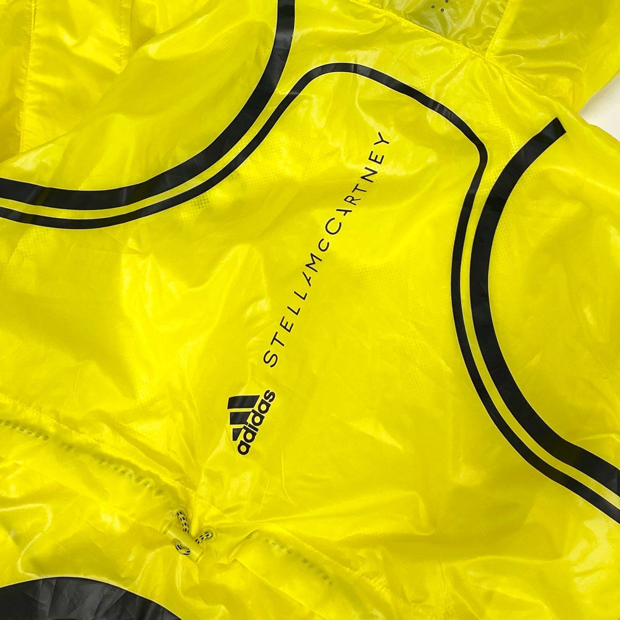 78i10《未使用品》タグ付 adidas by Stella McCartney アディダス ステラマッカートニー TruePace ランニングジャケット ロゴプリント 軽量 リフレクター HS8197 Mサイズ イエロー レディースo07t