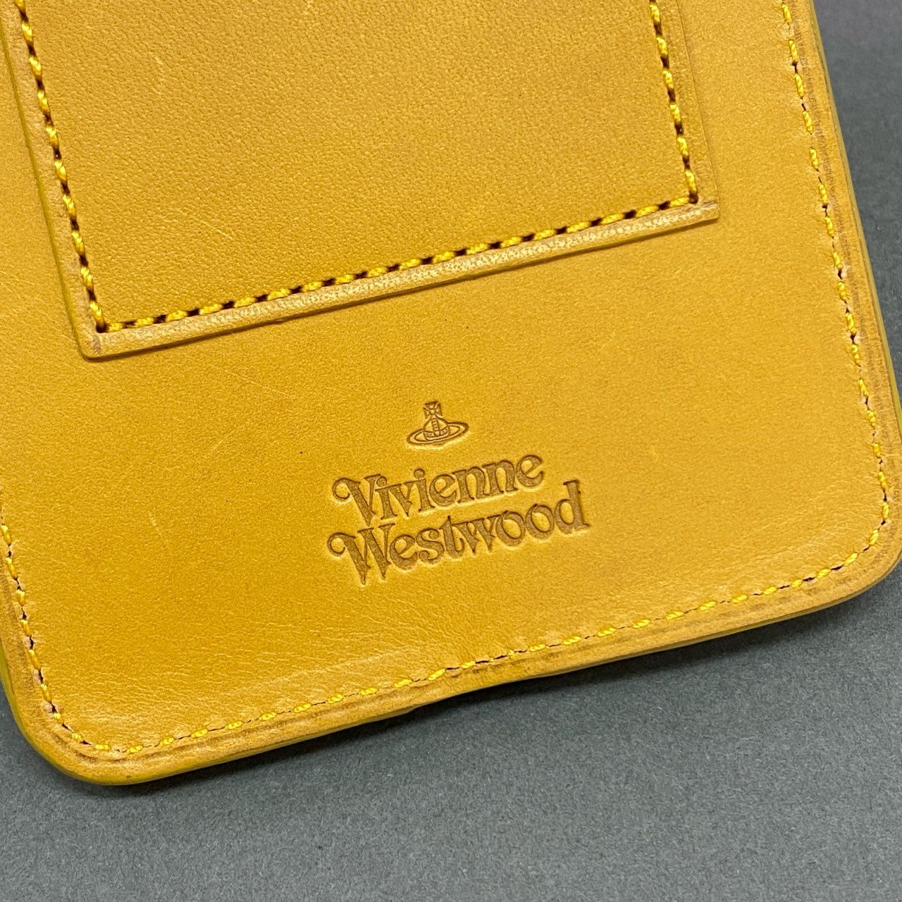 j29 Vivienne Westwood ヴィヴィアン ウエストウッド ORB CLIPS レザー スマホケース ポーチ イエロー Leather スマートフォン iPhone android