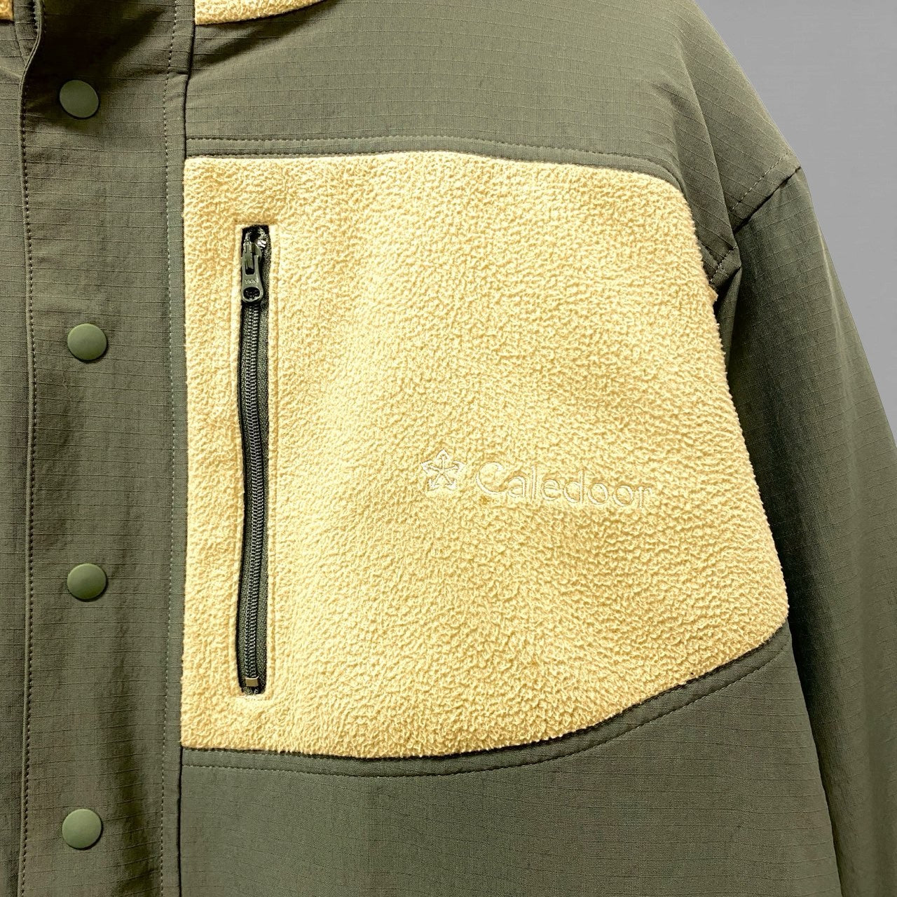 23c16 Caledoor カレドアー リバーシブルフリースジャケット プルオーバージャケット ハーフジップ Lサイズ ベージュ カーキ メンズ 男性用o07t