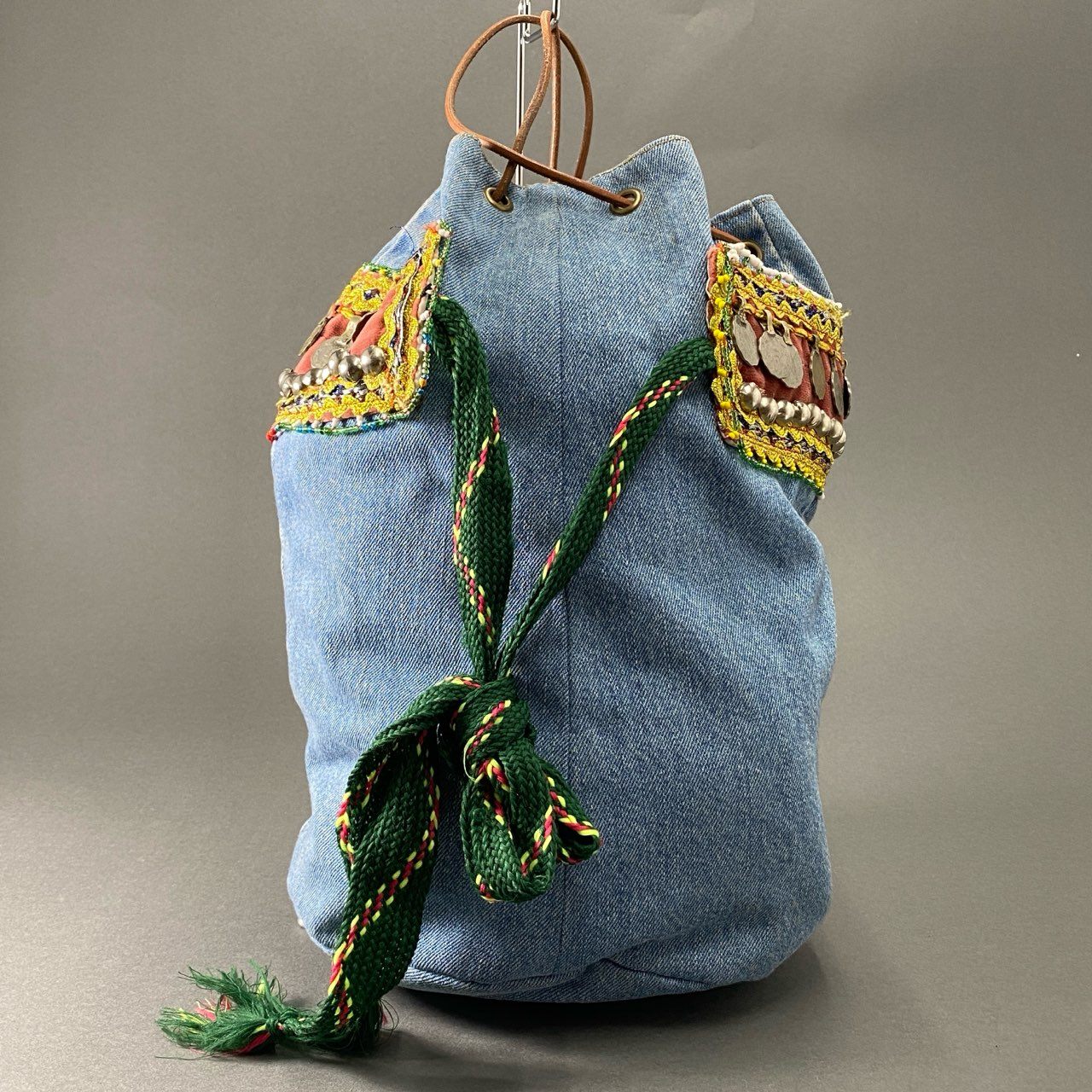 Af23 77circa ナナナナサーカ circa make afghan belt denim bag デニム 巾着ハンドバッグ 刺繍 コイン インディゴブルー