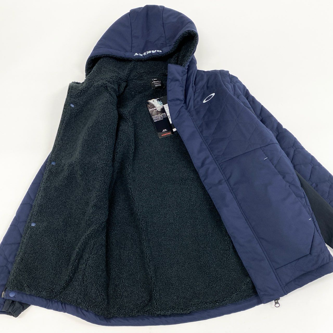 78i10-3《未使用品》タグ付 OAKLEY オークリー UNEVEN PUFF JACKET 3.0 中綿2wayジャケット ベスト ゴルフウェア アウター ロゴ刺繍 FOA402870 Mサイズ ネイビー メンズk02i