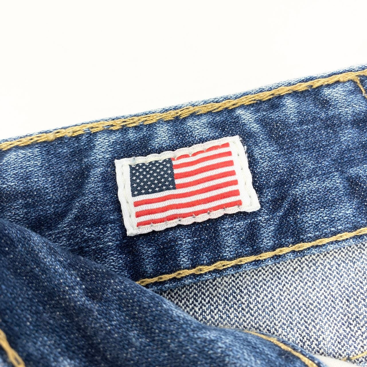 55d30 TRUE RELIGION トゥルーレリジョン 米国製 JOEY BIG T フレアデニム ブーツカット ラインストーン SEAT34 インディゴ コットン100％ メンズ 紳士服u02t