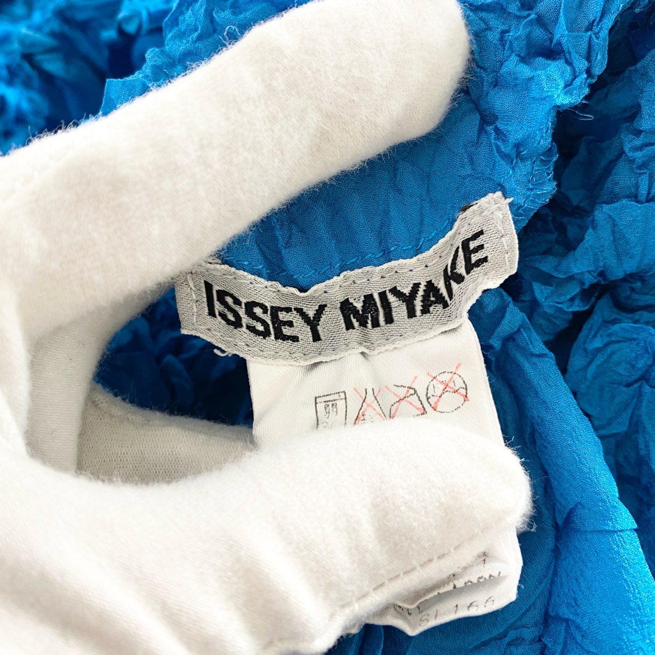 25d14 ISSEY MIYAKE イッセイミヤケ 白タグ メレンゲシワ加工半袖Tシャツ カットソー トップス IM94-FJ628 サイズM ブルー ポリエステル レディース