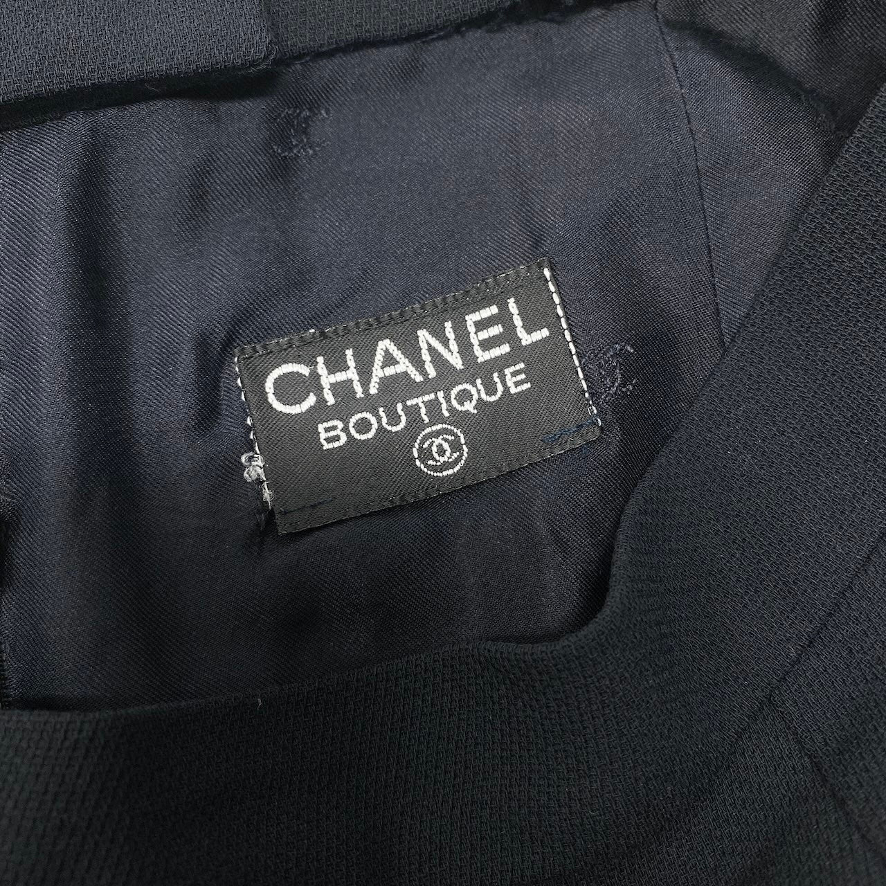Cd22 CHANEL BOUTIQUE シャネル プリーツスカート ひざ丈スカート ココマークボタン  ネイビー ウール100％ レディース 女性服u02t