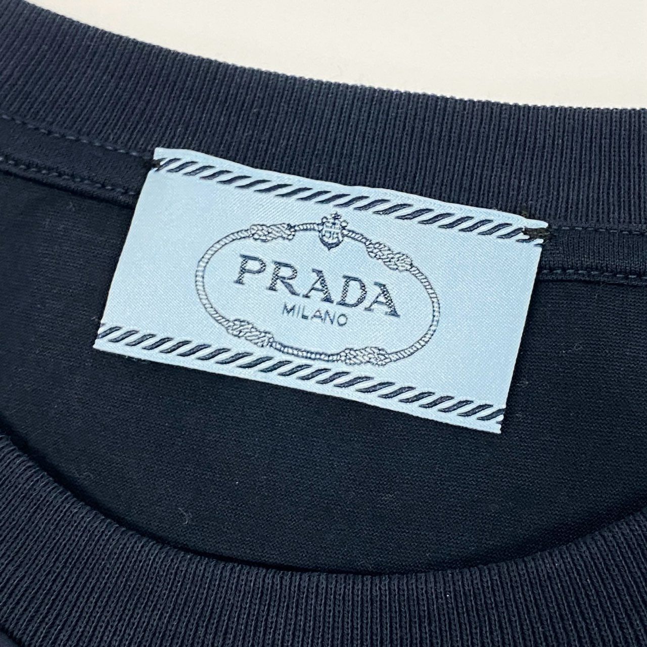 70b9 《美品》 PRADA プラダ フリル装飾 半袖カットソー Tシャツ トップス L ネイビー コットン レディースk02i