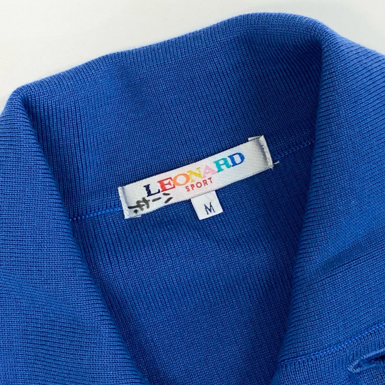 76i12 LEONARD レオナール 襟付きニットポロシャツ セーター トップス ロゴ金ボタン M ブルー ウール レディースu02t