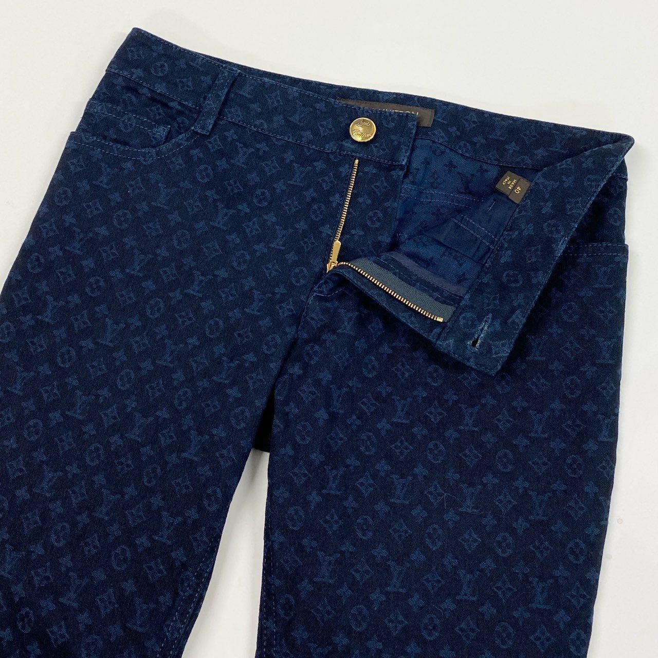 50b7 LOUIS VUITTON ルイヴィトン モノグラムデニムパンツ 裾レザー Monogram Denim Jeans 40サイズ インディゴ レディース 女性用ta1