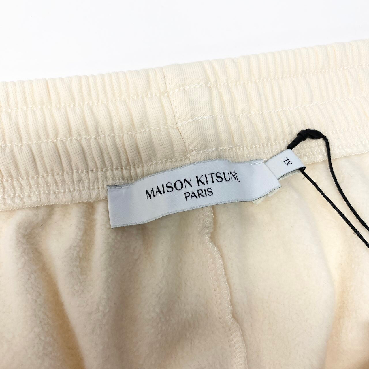 63c30 【新品保管品】MAISON KITSUNE メゾンキツネ コットンジョグパンツ スウェットパンツ ロゴプリント ボトムス 裏起毛 IM01304KM0022 XLサイズ アイボリー コットン100％ メンズ 男性用o07t