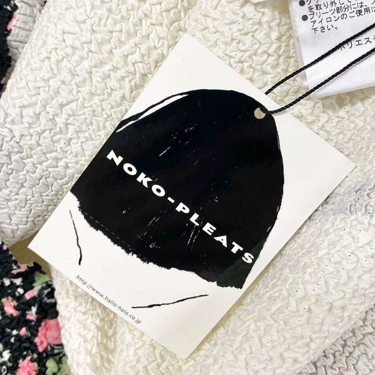 2c29 【未使用タグ付】 NOKO-PLEATS ノコプリーツ プリーツジャケット 長袖 小花柄 フラワープリント レディース 女性服 サイズ40 ホワイト ポリエステル100％u02t
