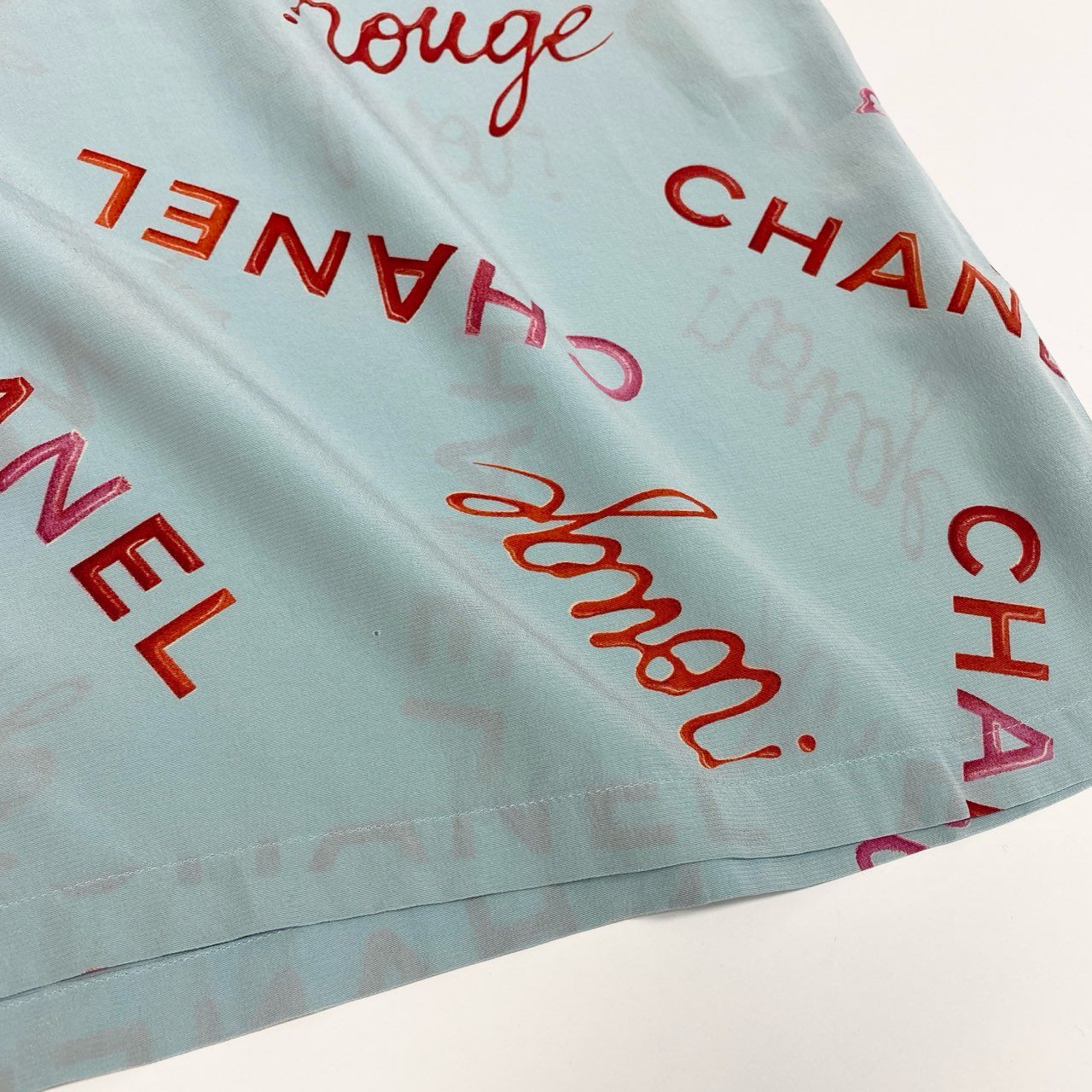 Ca15 【archive】CHANEL ヴィンテージ シャネル 1996年 96P ロゴプリント シルクブラウス 半袖ブラウス サイズ36 ブルー系 レディース トップスta1