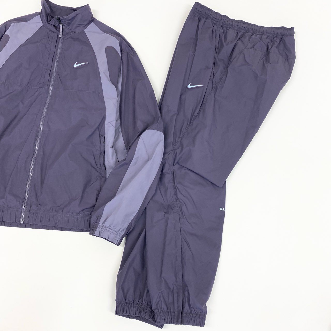 57f6 NIKE x NOCTA ナイキ ノクタ コラボ NRG DY TRACK JACKET PANT セットアップ トラックジャケット パンツ ボトムス DO2807-573 Lサイズ パープル ダークレーズン ナイロン