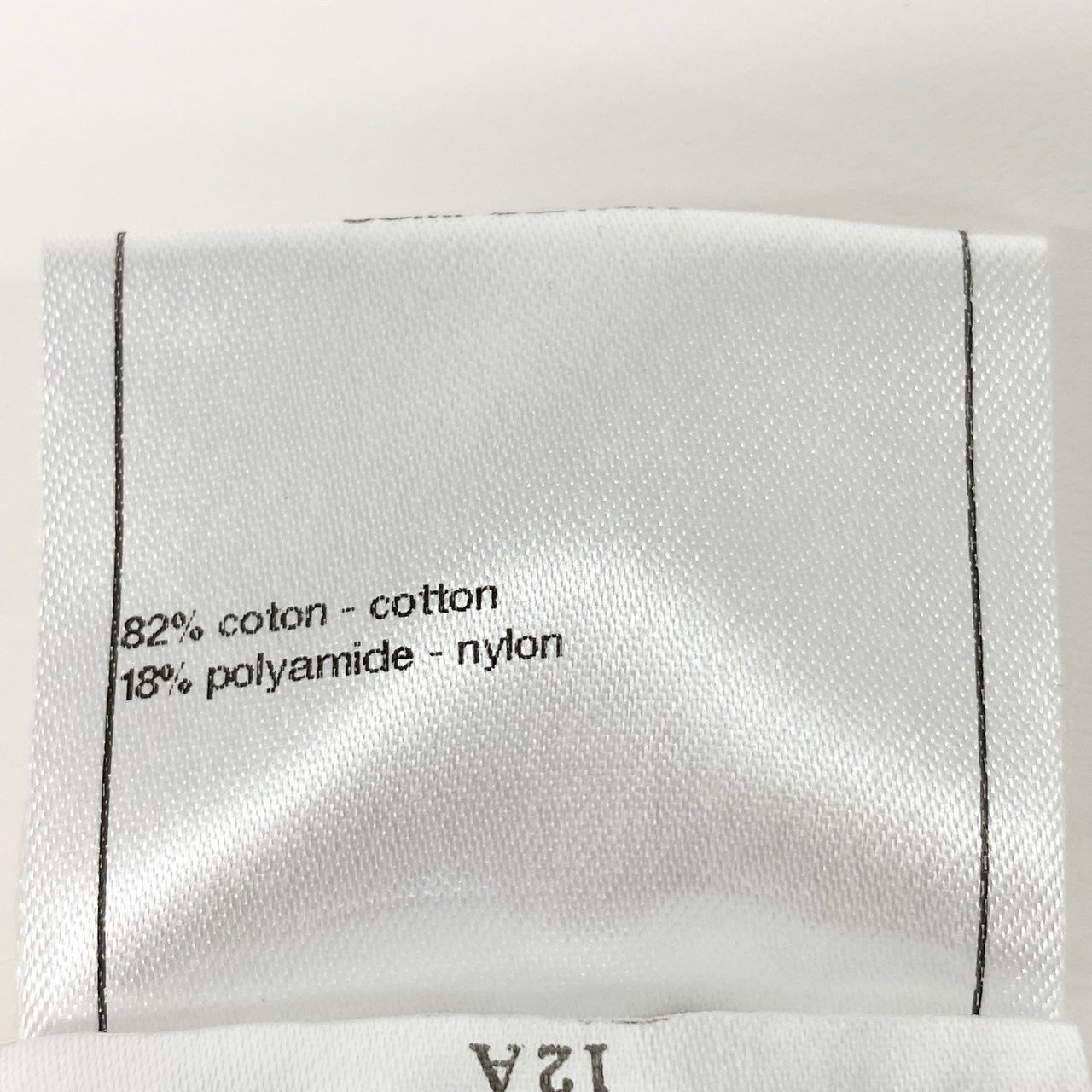 27L1 CHANEL シャネル fフロント ココマーク リバーシブル ニットTシャツ トップス P38434K02612 サイズ34 ネイビー ホワイト レディース カットソー 半袖ニットk02i