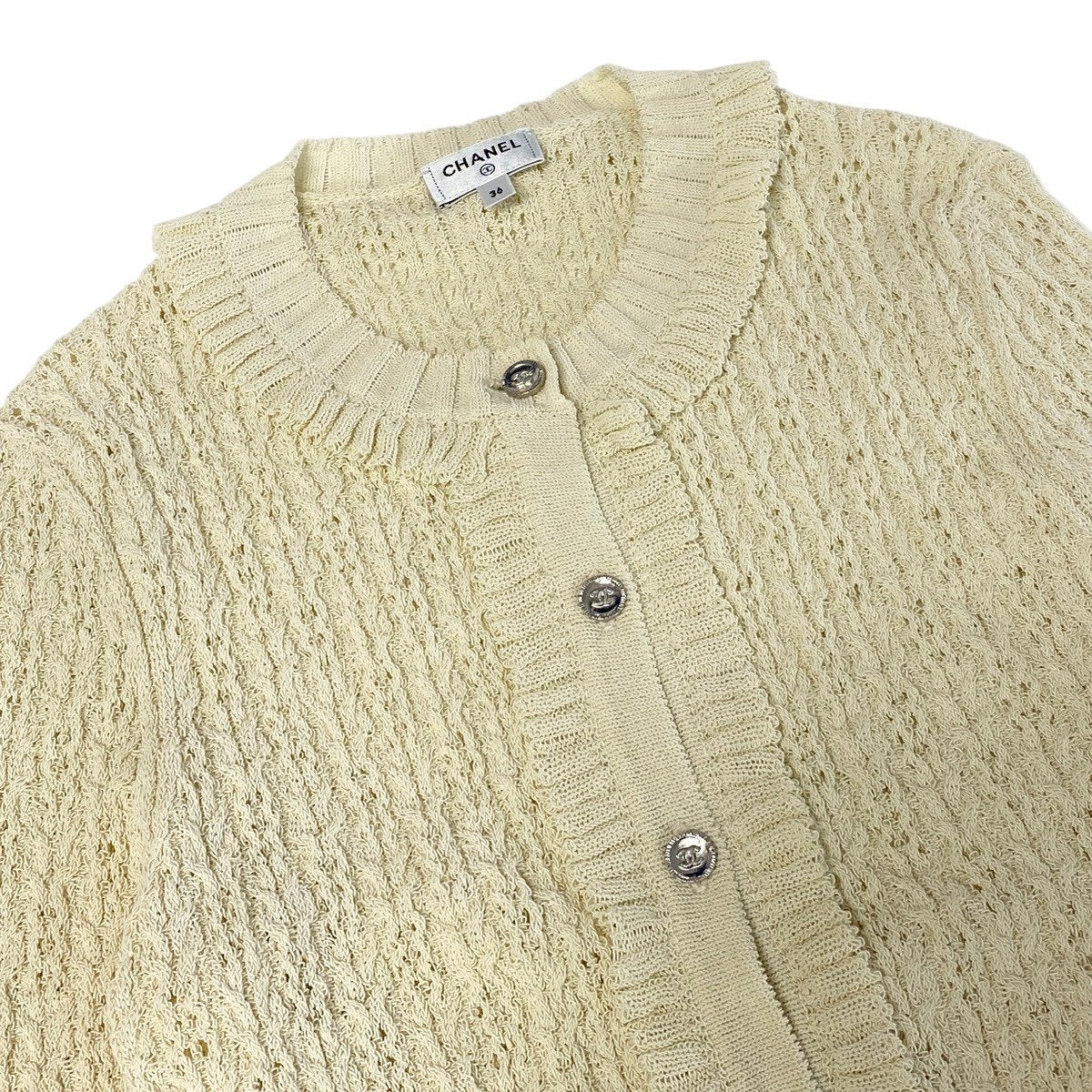 Cj22 CHANEL 2025 クルーズコレクション フリルカーディガン ココマーク P78635 36サイズ アイボリー レディース 女性用k02i