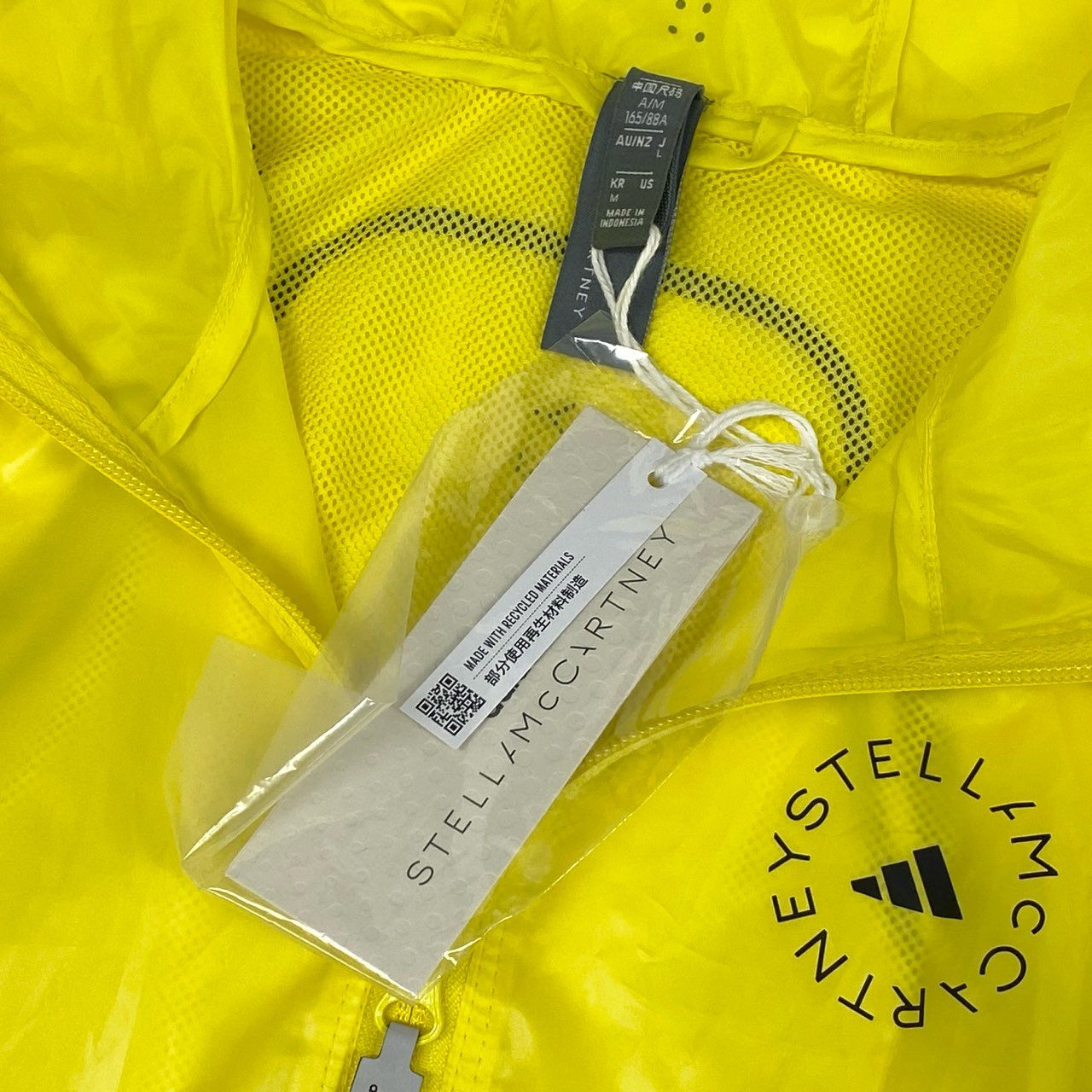 78i10《未使用品》タグ付 adidas by Stella McCartney アディダス ステラマッカートニー TruePace ランニングジャケット ロゴプリント 軽量 リフレクター HS8197 Mサイズ イエロー レディースo07t