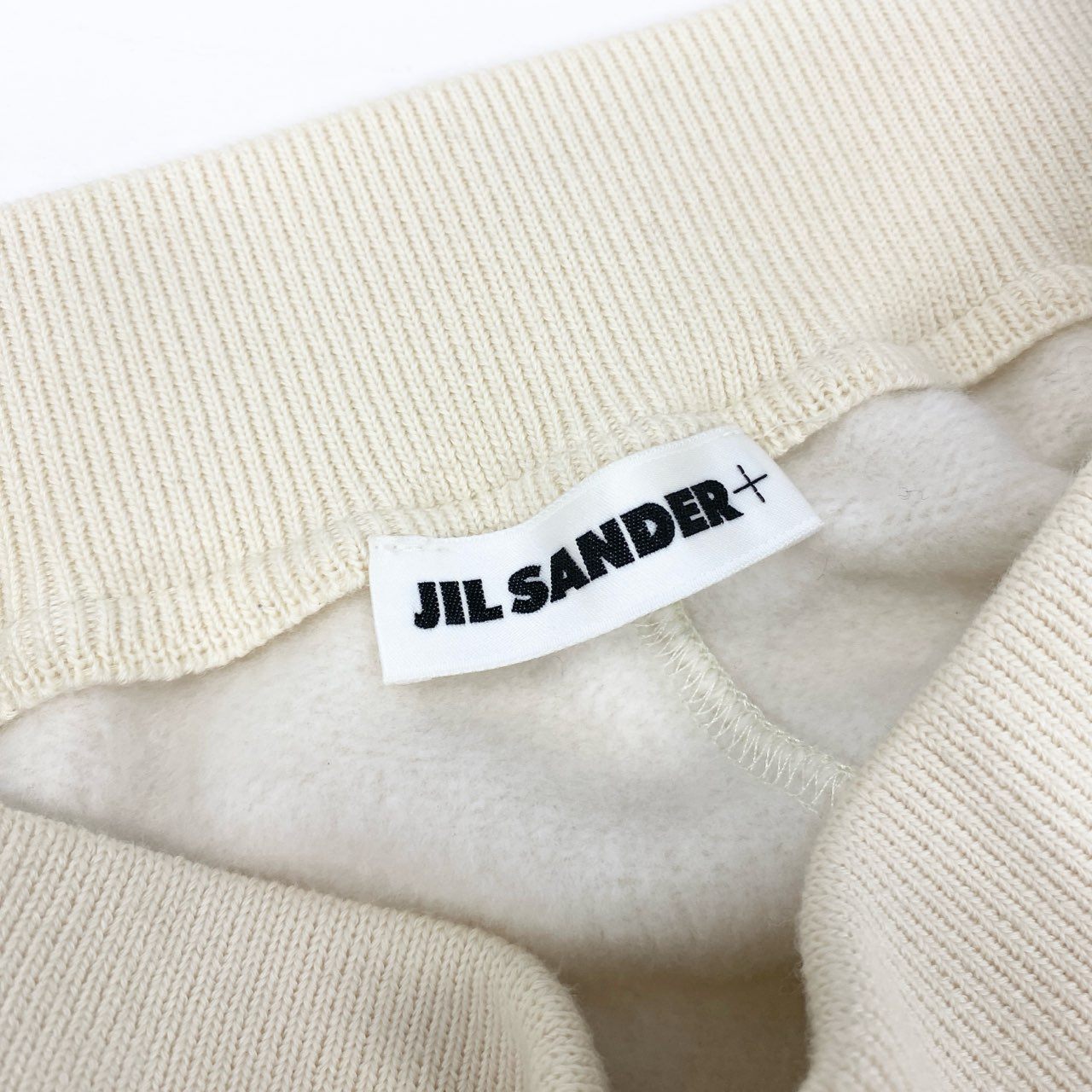 4h26 JIL SANDER + ジルサンダー サイドライン スウェットパンツ ボトムス 裏起毛 イージーパンツ リブ J40KA0158 32 クリーム ウール コットン レディースo07t