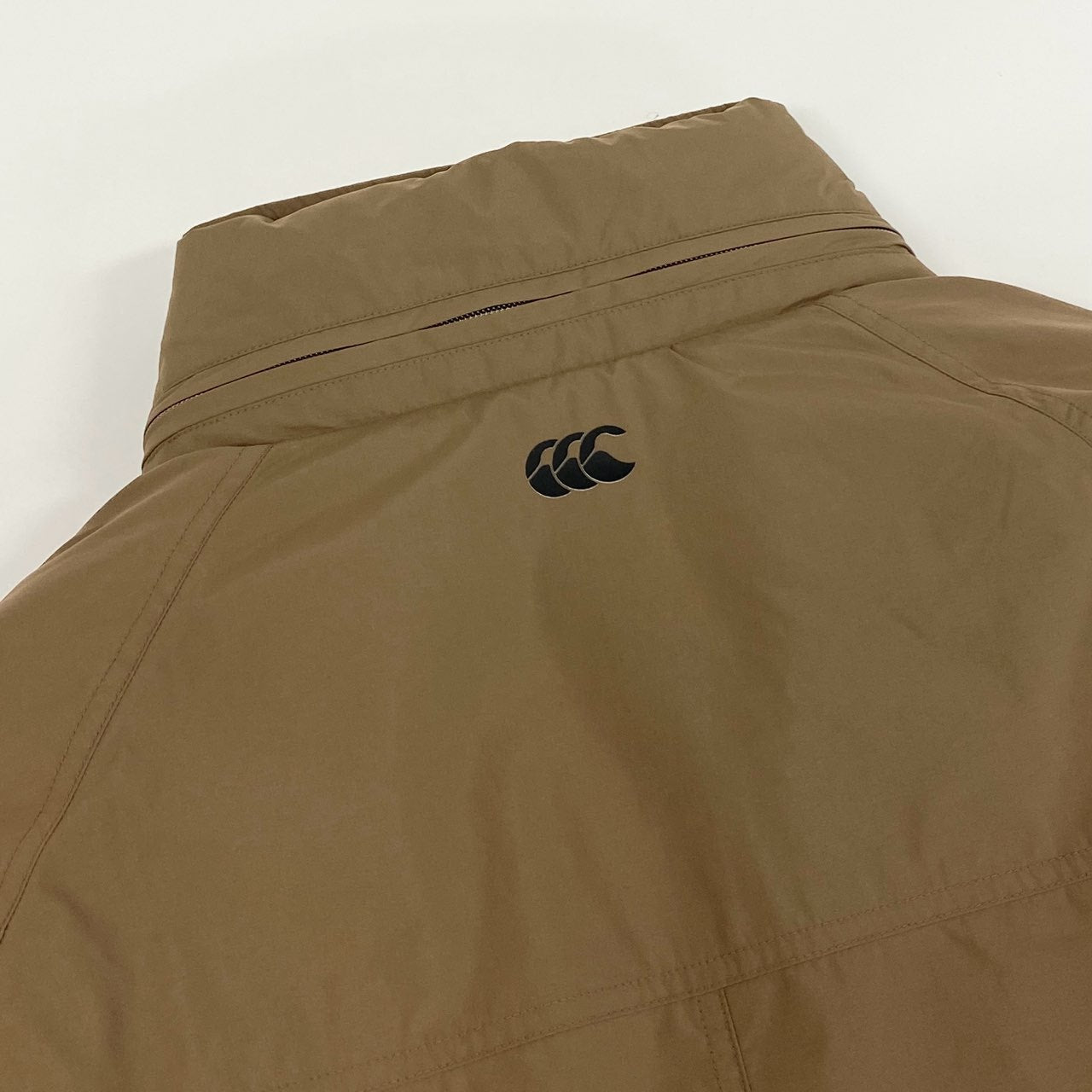 24f18 《未使用保管品》タグ付 定価\68,000 CANTERBURY カンタベリー DEFENDER PUFF COAT 中綿ジャケット コート HTM7150 1 ブラウン系 メンズ