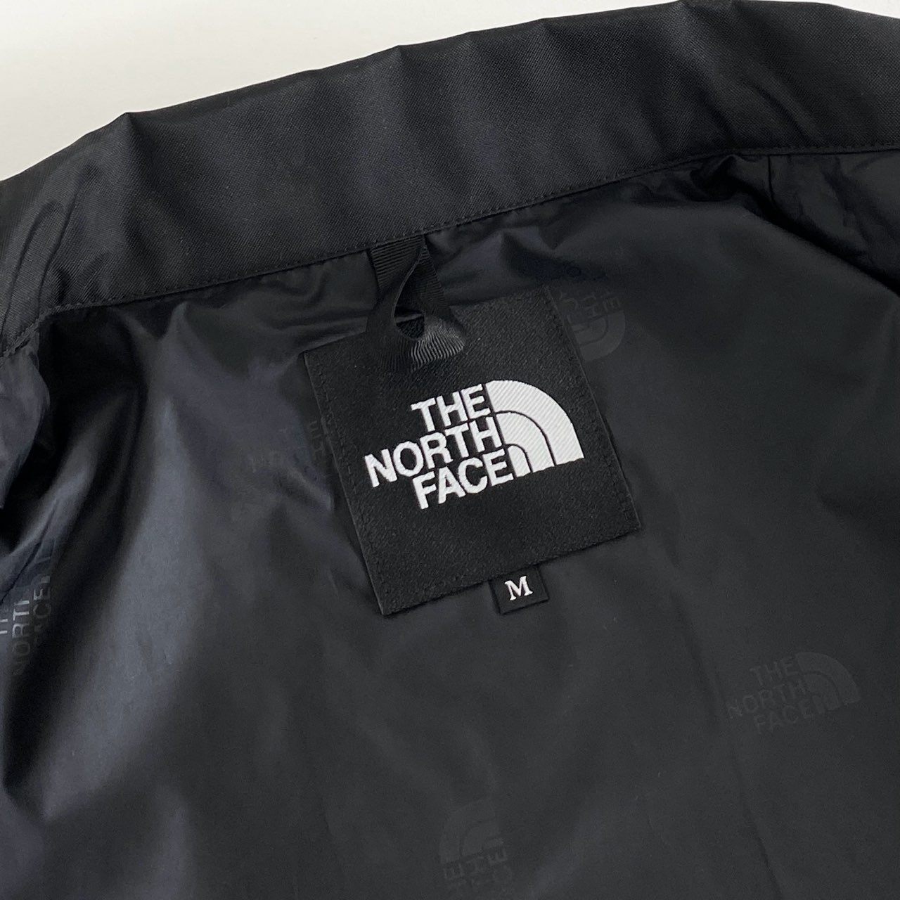 67i5 THE NORTH FACE ザノースフェイス NEVER STOP ING THE COACH JACKET ネバー ストップ アイエヌジー ザ コーチ ジャケット NP72335 Mサイズ ブラック 画像参照