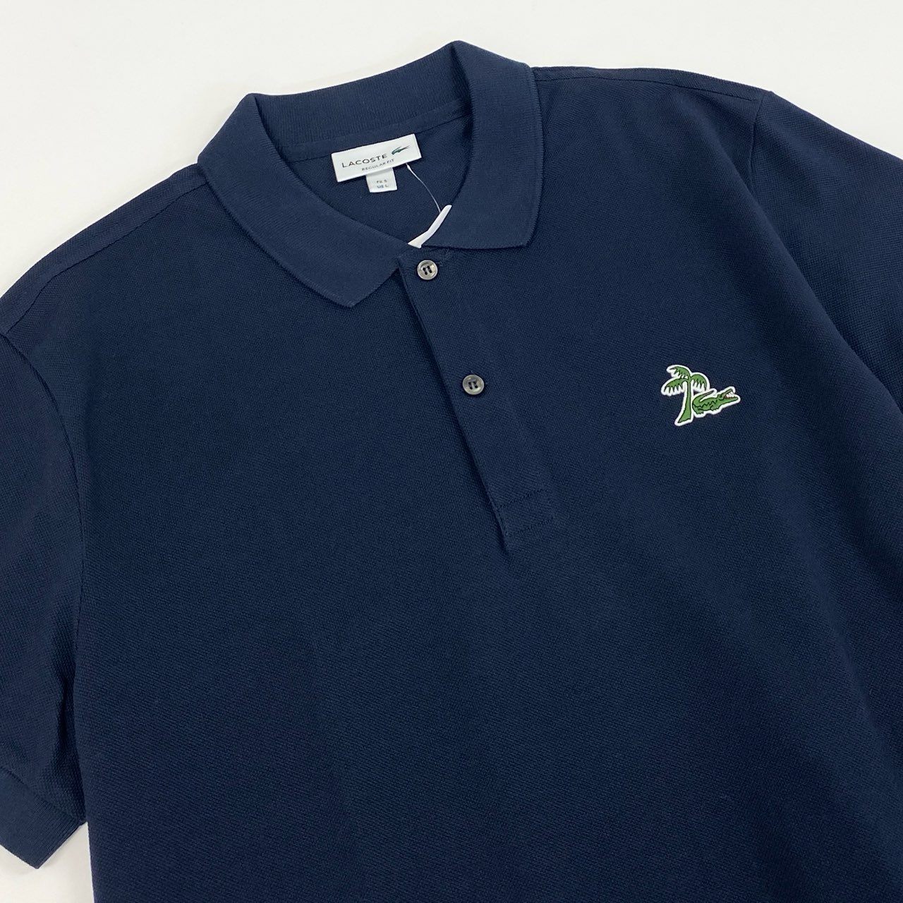 18f19 《新品タグ付き》 LACOSTE ラコステ 半袖ポロシャツ トップス 鹿の子 ヤシの木 ワンポイントロゴ刺繍 サイズ5 ネイビー メンズ 紳士服