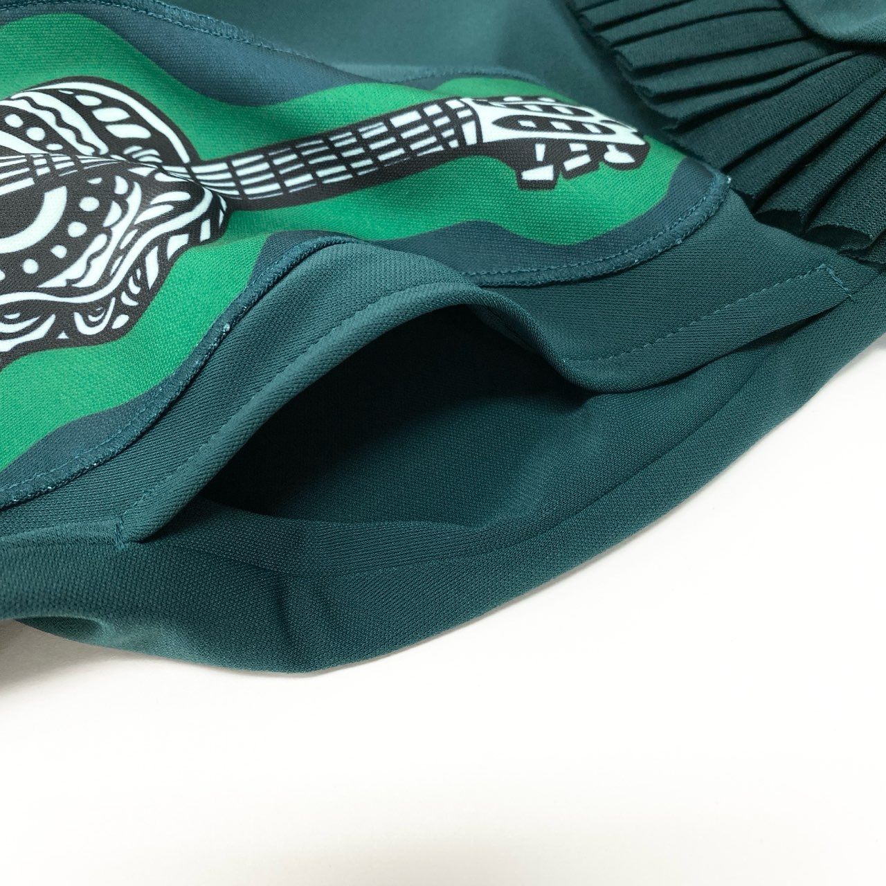 84b27 TOKUKO 1er VOL トクコプルミエヴォル ロングシャツワンピース 長袖 楽器柄 伸縮ストレッチ レディース 女性服 サイズ9 グリーン系u02t