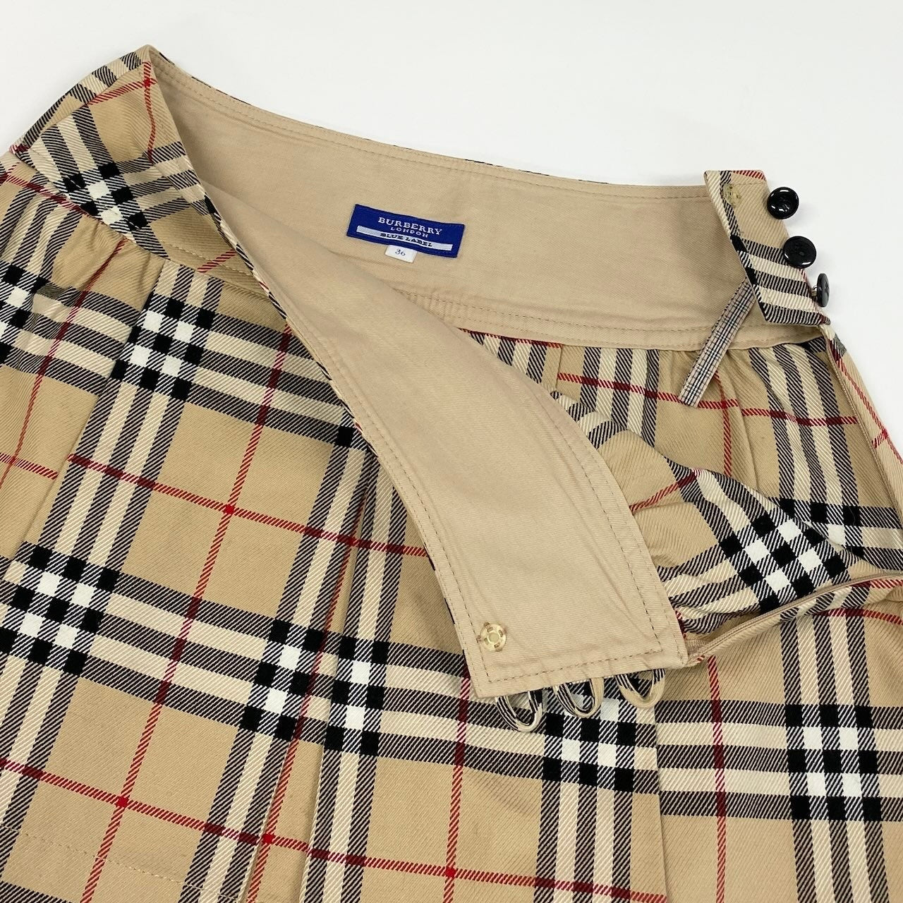 20d18 BURBERRY LONDON BLUE LABEL バーバリーロンドン ブルーレーベル ノバチェック ミニスカート タックスカート ロゴボタン サイズ36 ベージュ レディース 女性用u02t