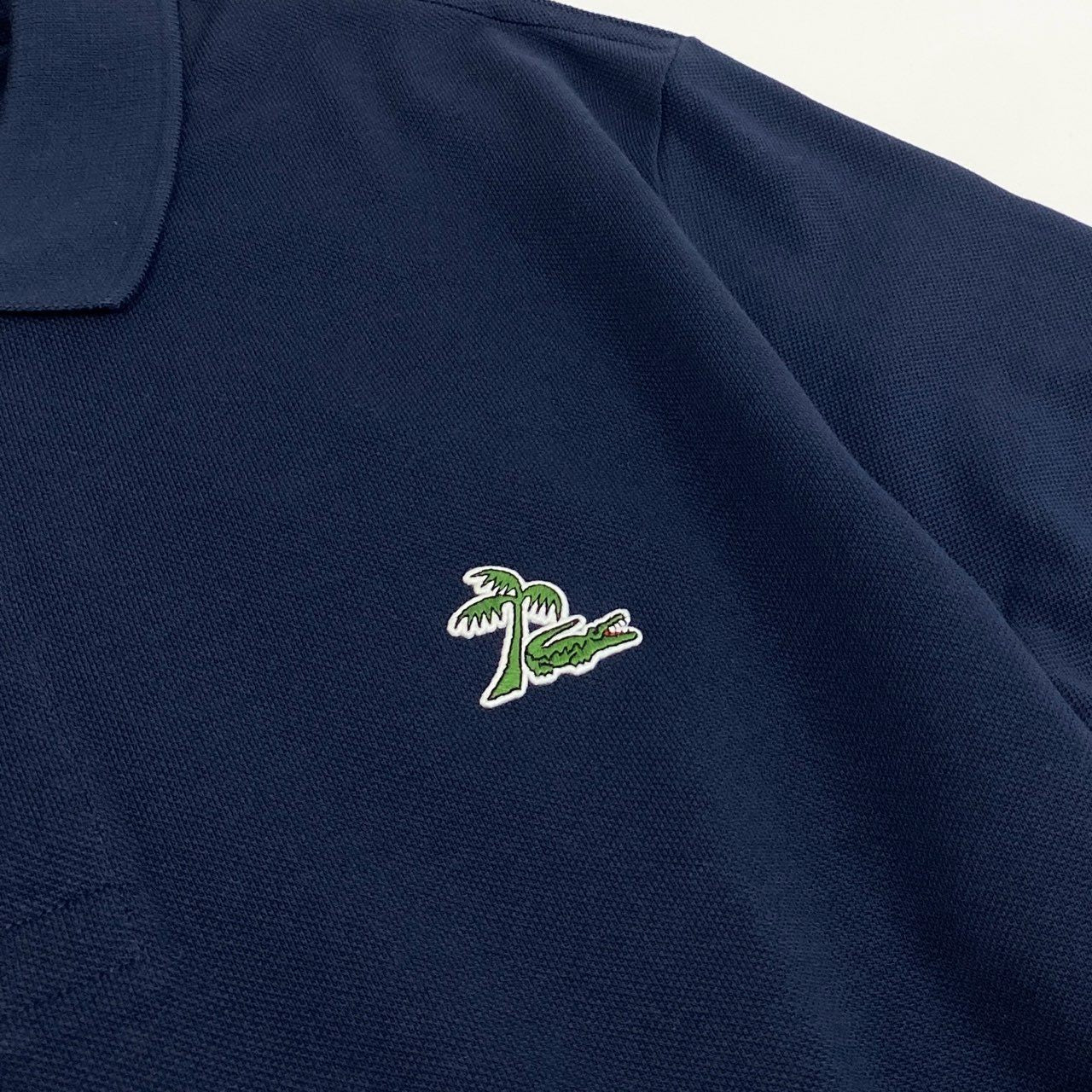 18f19 《新品タグ付き》 LACOSTE ラコステ 半袖ポロシャツ トップス 鹿の子 ヤシの木 ワンポイントロゴ刺繍 サイズ5 ネイビー メンズ 紳士服