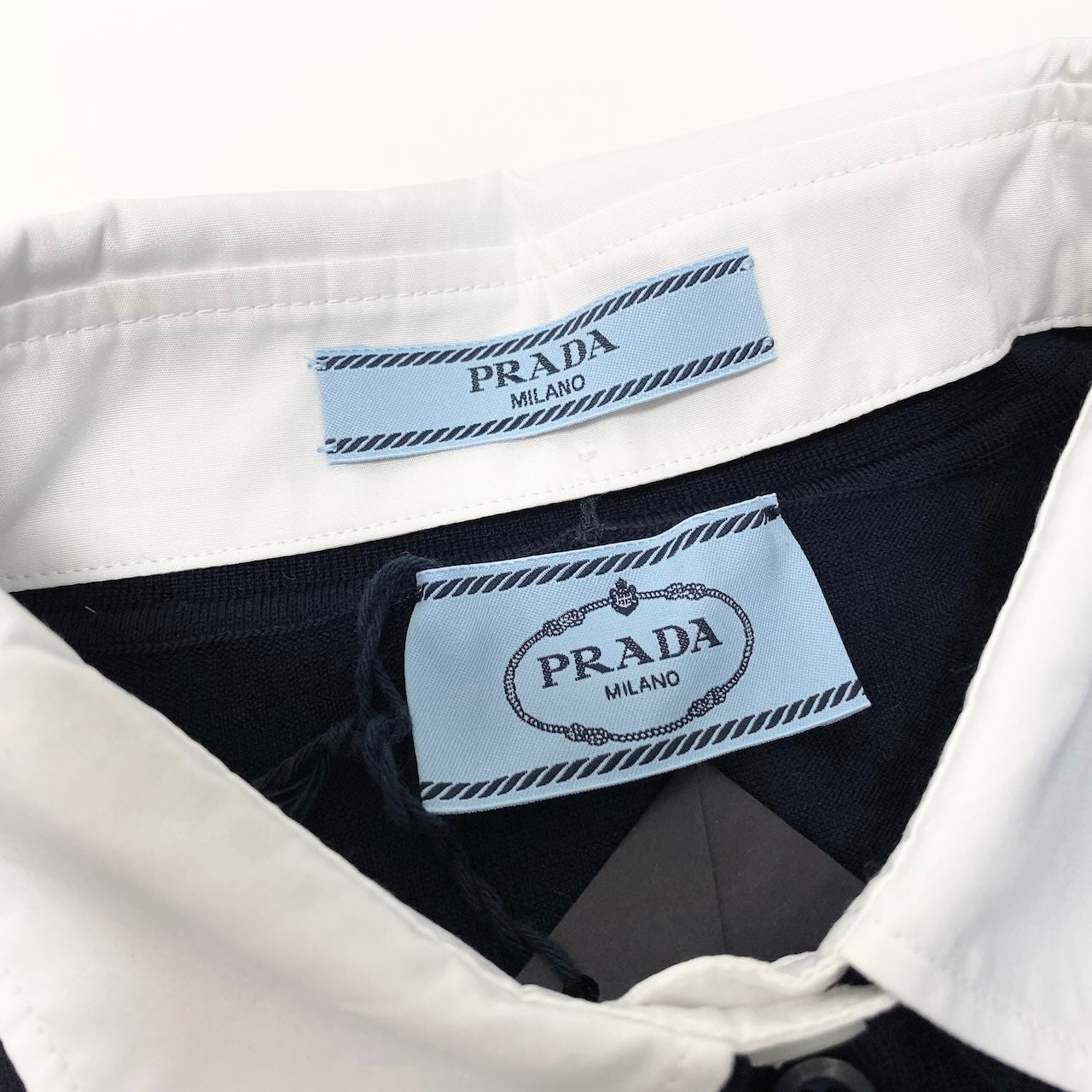 83c27 【新品保管品】PRADA プラダ ニットポロシャツ ロングスリーブニットセーター 襟取り外し可 44サイズ ネイビー ホワイト ウール100％ レディース 女性用u02t