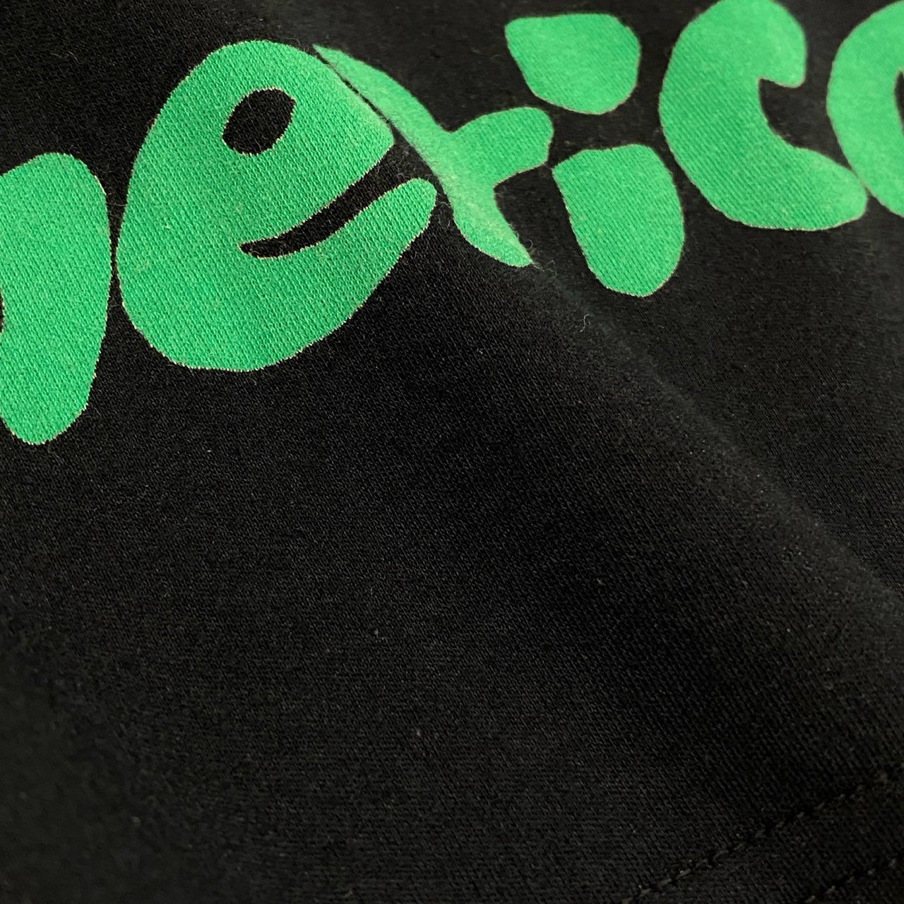 33b27 TOKUKO 1er VOL TOKUKO モックネック チュニックワンピース ロングスリーブ アニマルプリント レディース 女性服 ブラックu02t