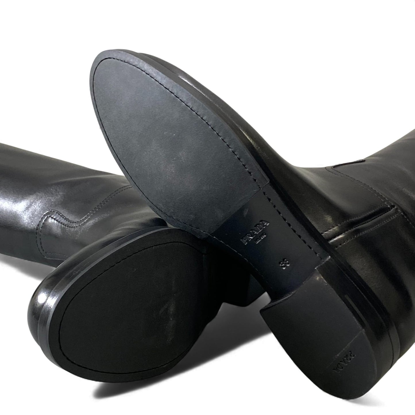 2L11 PRADA プラダ バックルストラップ付 型押しロゴ ロングブーツ サイズ38 ブラック レザー レディース 靴 ミドルブーツk02i