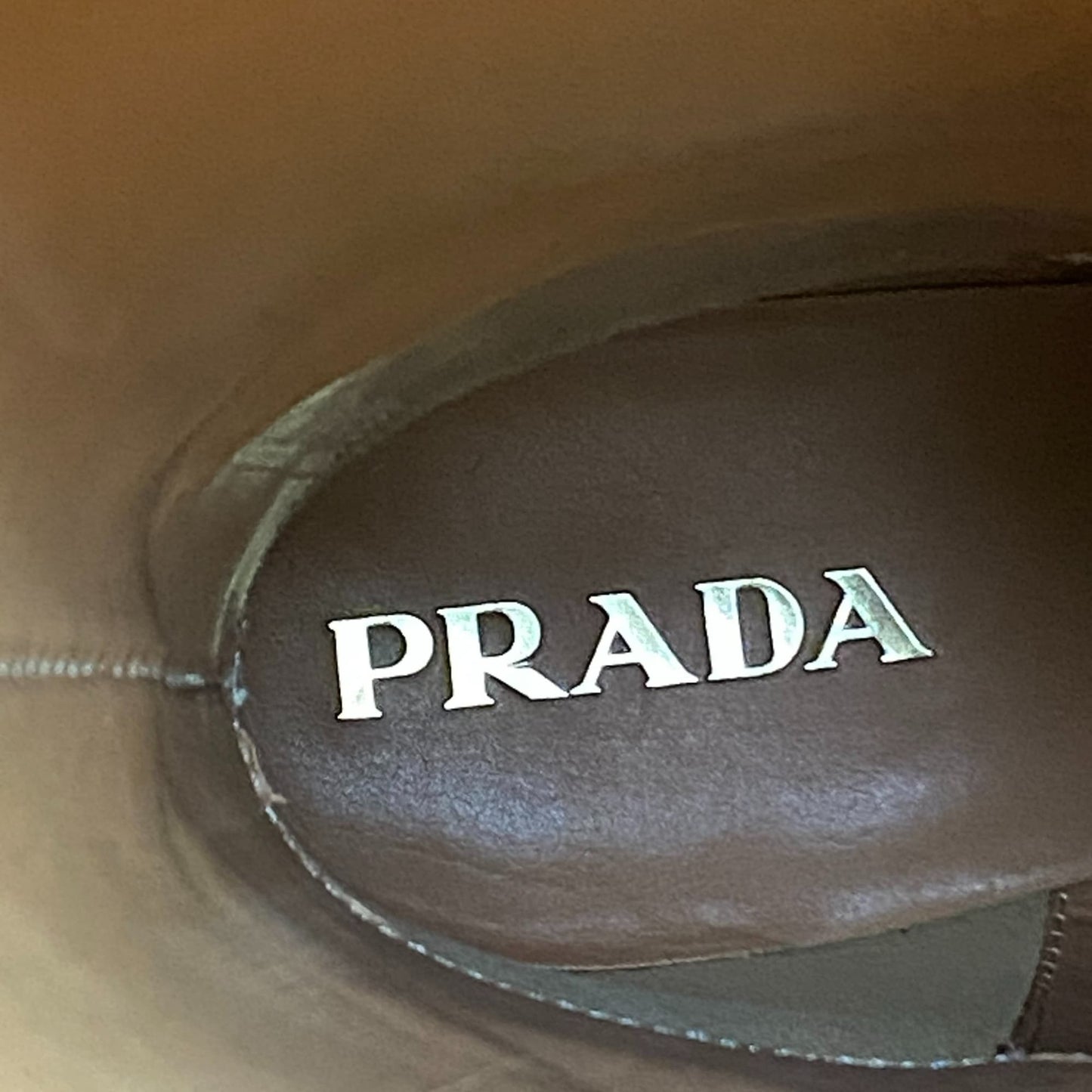 L11 PRADA プラダ バックルストラップ付 型押しロゴ ロングブーツ サイズ38 ブラック レザー レディース 靴 ミドルブーツk02i