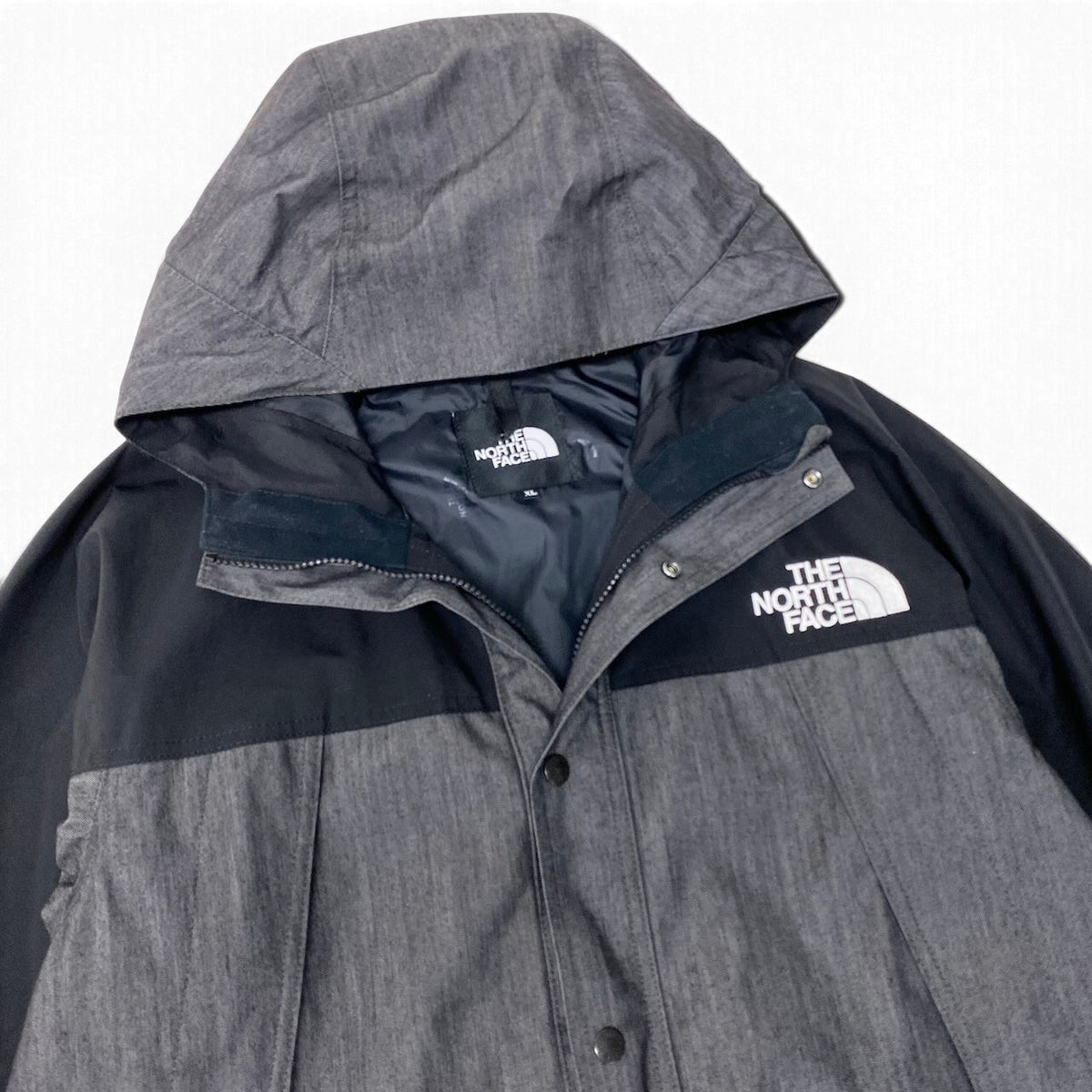 12i25 THE NORTH FACE ザノースフェイス マウンテンライトデニムジャケット ゴアテックス ロゴ刺繍 XLサイズ グレー ブラック ナイロン100％ メンズ 男性用u02t