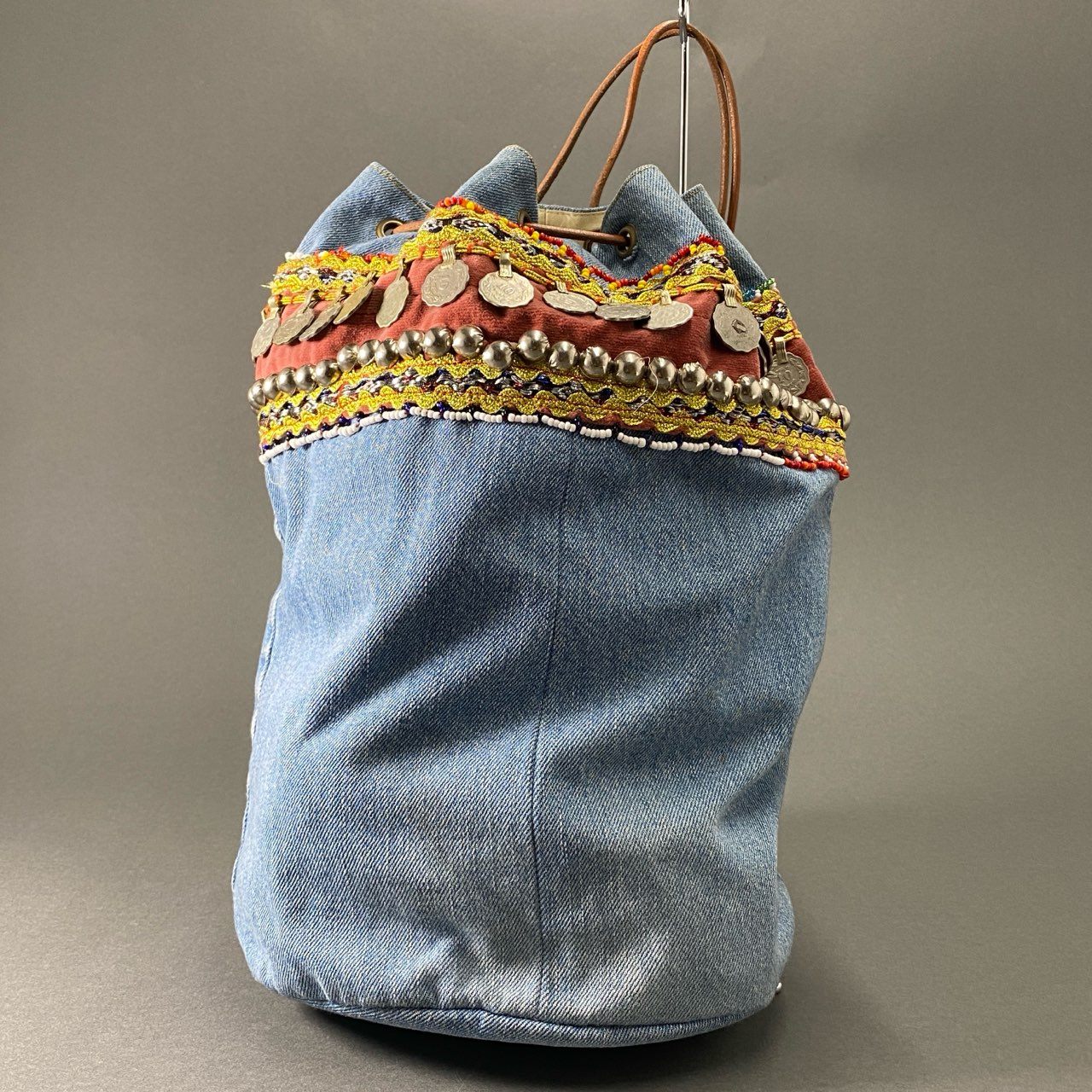 Af23 77circa ナナナナサーカ circa make afghan belt denim bag デニム 巾着ハンドバッグ 刺繍 コイン インディゴブルー